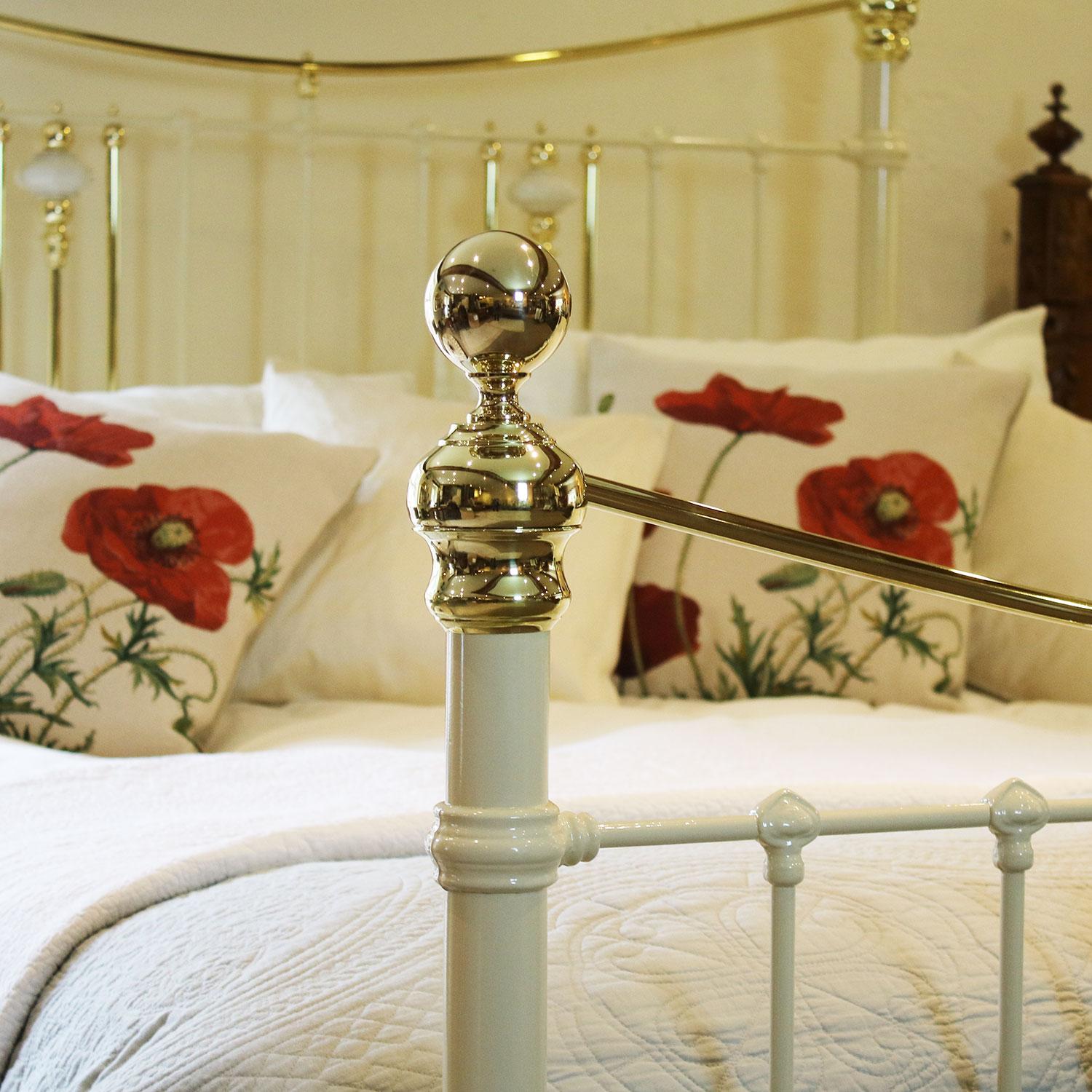 Cast iron and brass bedstead, finished in cream with ivory octagonal china decorations and curved brass top rails.

The price includes a standard firm bed base to support the mattress. 

The mattress, bedding and bed linen are extra.