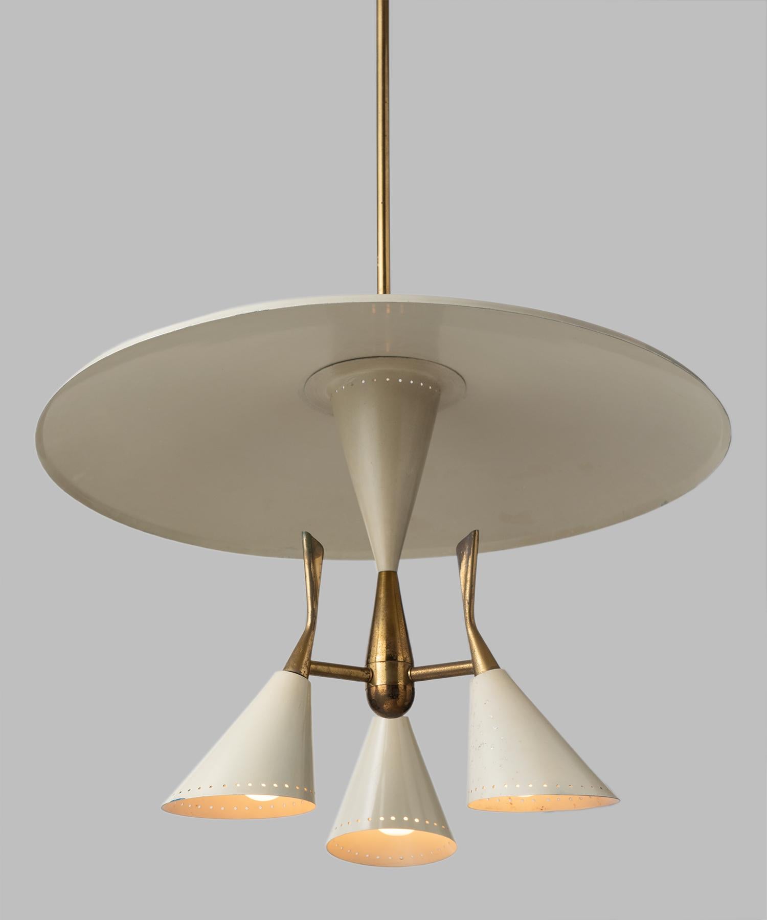 Cream and brass ceiling lamp, Italy, circa 1930.

Modern lamp with three pivoting metal shades and brass detailing. Original brass rod and canopy.

Measures: 24