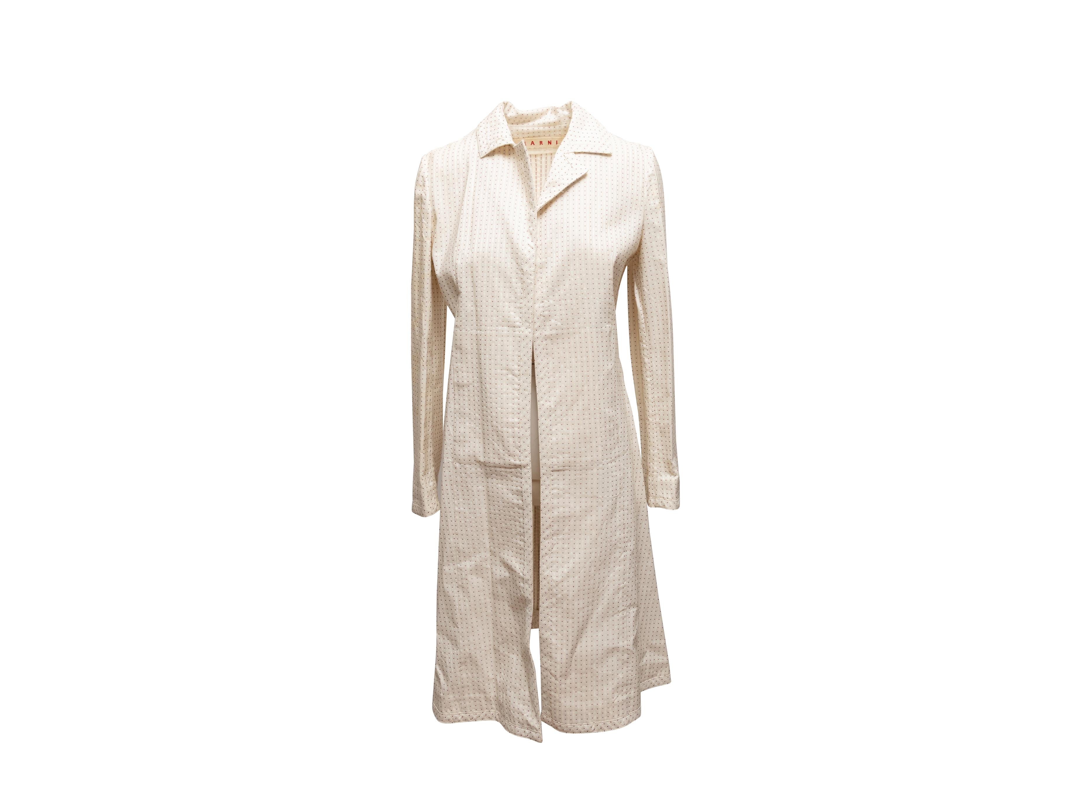 Trench en coton à pois crème et marron, Marni. Revers cranté. Deux poches sur les hanches. Poitrine de 36