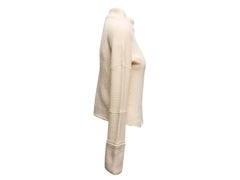 Pull à col roulé en cachemire Brunello Cucinelli, couleur crème
