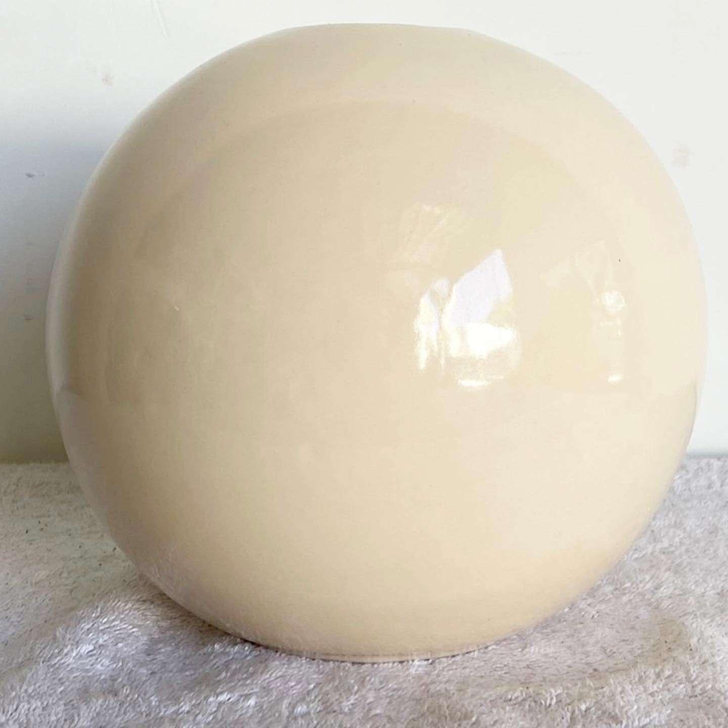 Incredible vintage postmodern ceramic vase. Displays a wonderful spherical shape.

