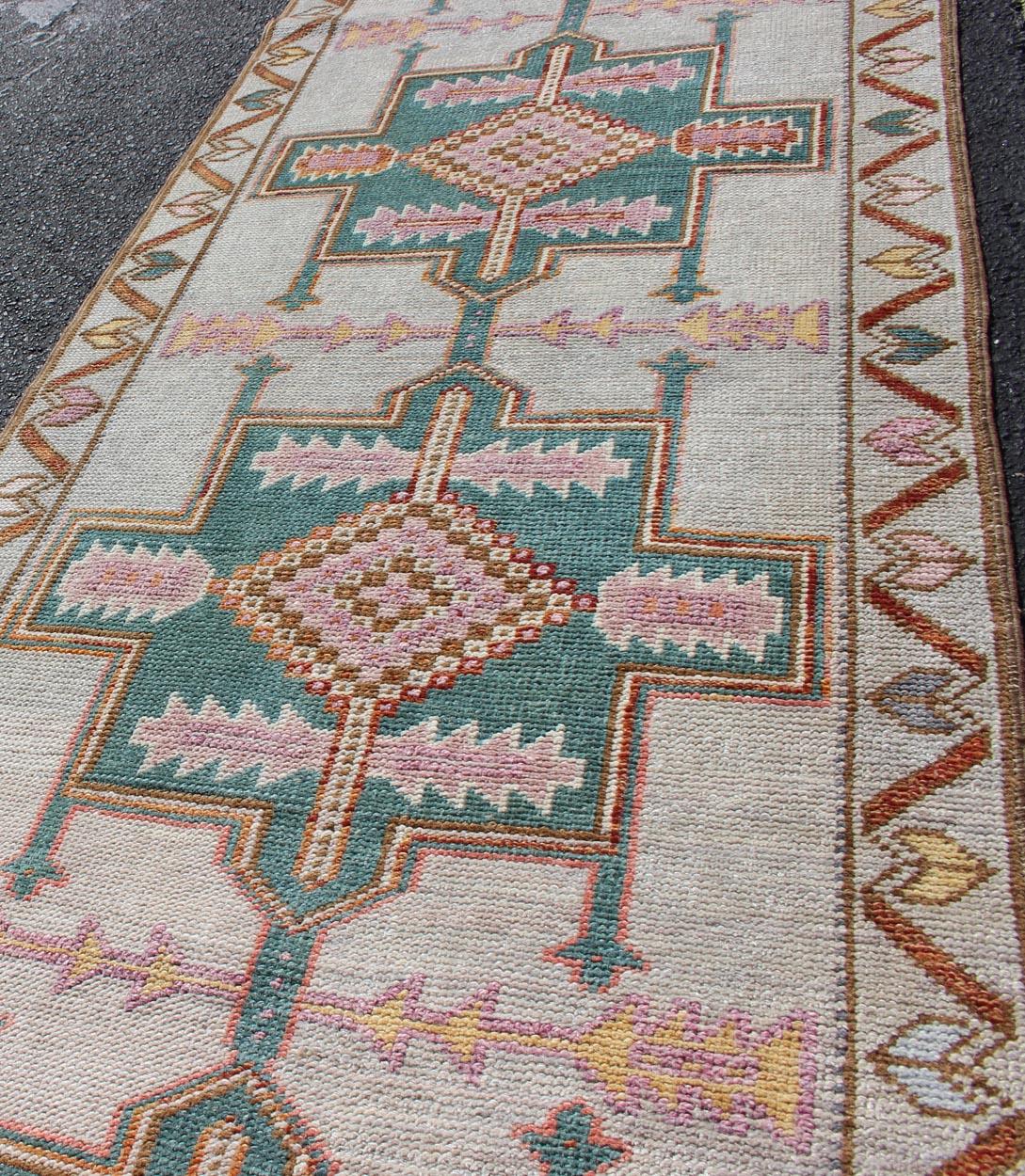 20th Century Cream Color Vintage Turkish Oushak Runner with Repeating Geometric Design For Sale