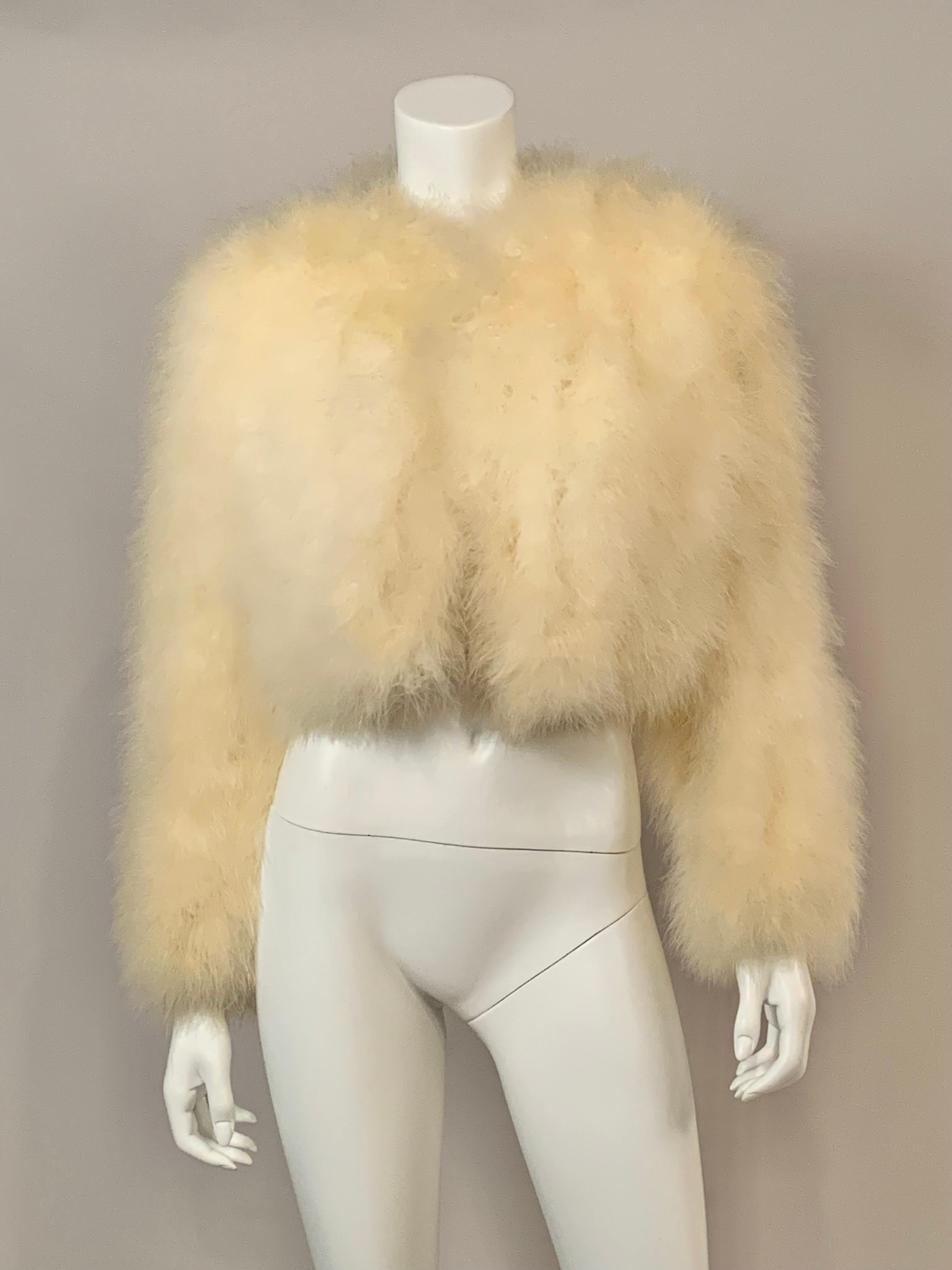 This marabou feather jacket is a  fun piece to have in your closet for dressing up or dressing  down.  It is a classic 