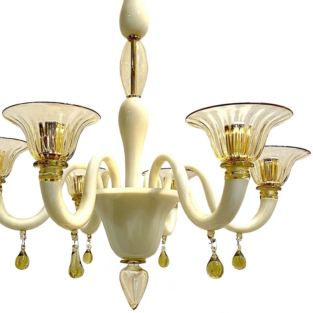 A circa 1960's Italian Murano cream and amber glass chandelier with 6 lights. 

Measurements:
Current drop: 30