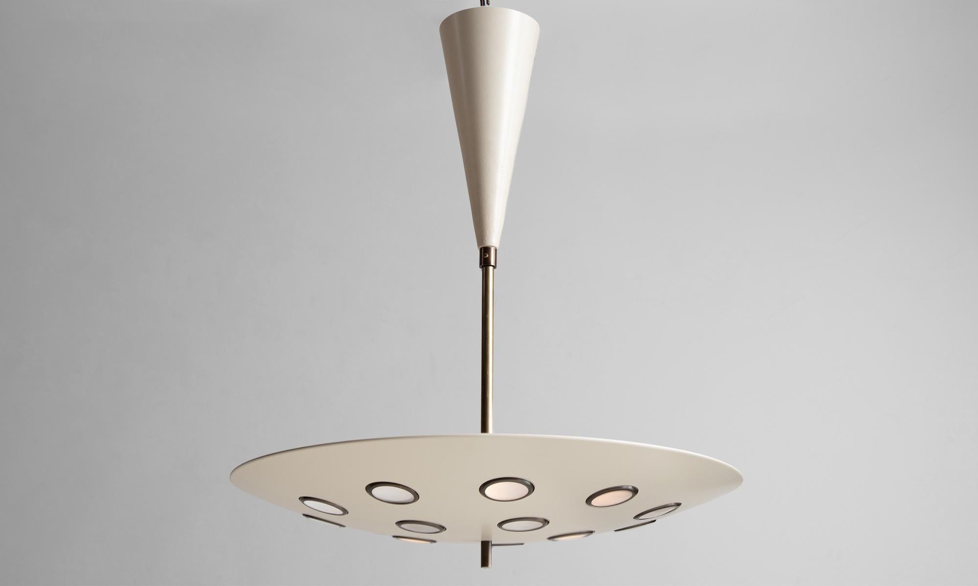 Cream cutout chandelier

Italy 21st century

Brass chandelier with painted aluminum disc with 15 satin lenses. E27 socket

Measures: 24”D x 24”H.

*Please Note: This fixture is made in Italy, and comes newly wired (eu wiring). It is not UL Listed.
