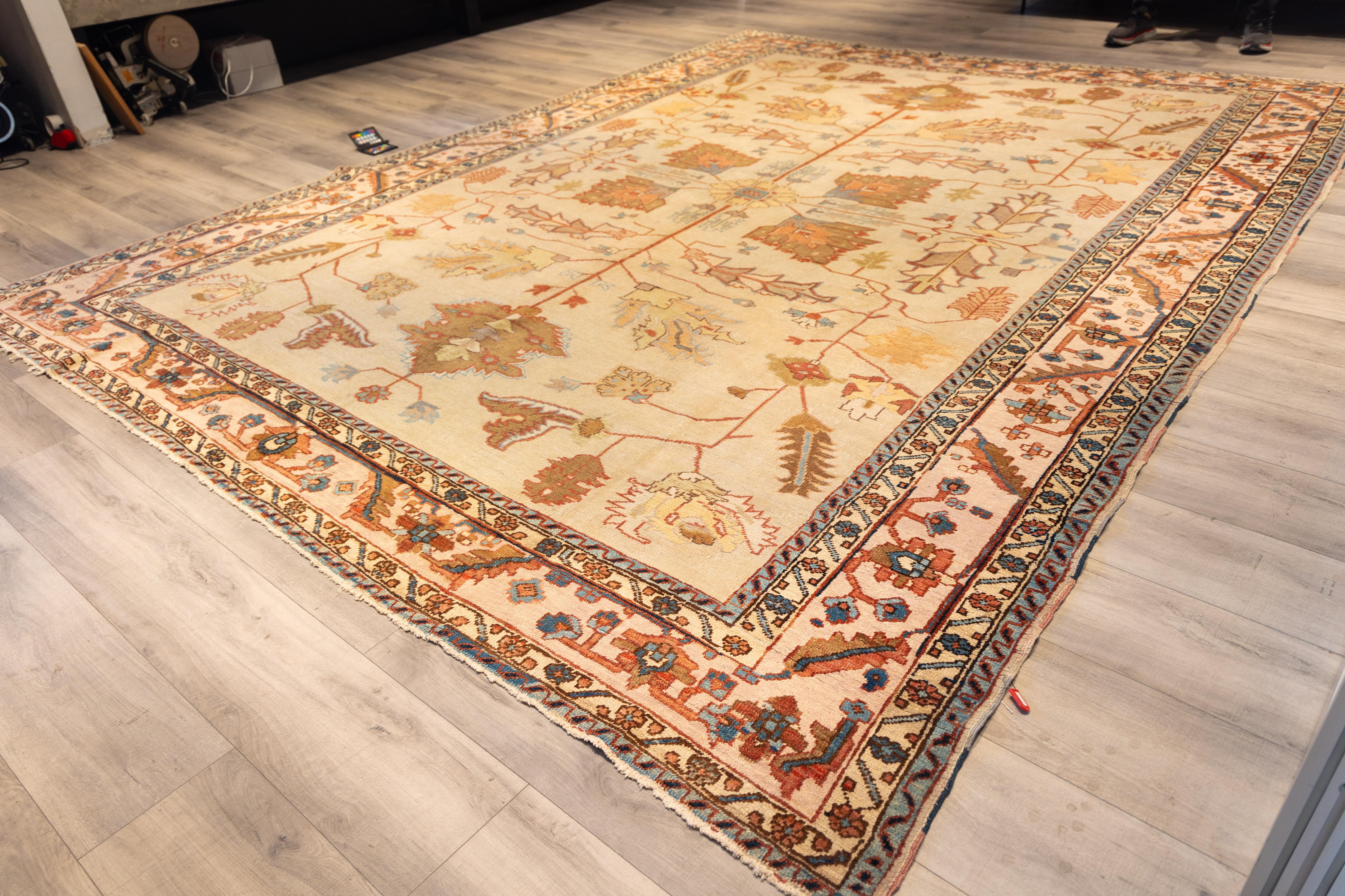 Persian Antique cream field early 20th century north persian rug For Sale