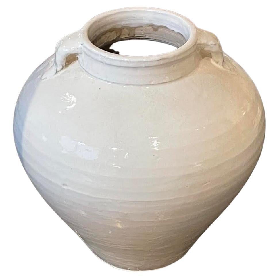 Contemporary Chinese cream vase with two small handles.
Part of a large collection of cream vases.
Many sizes and shapes available.
