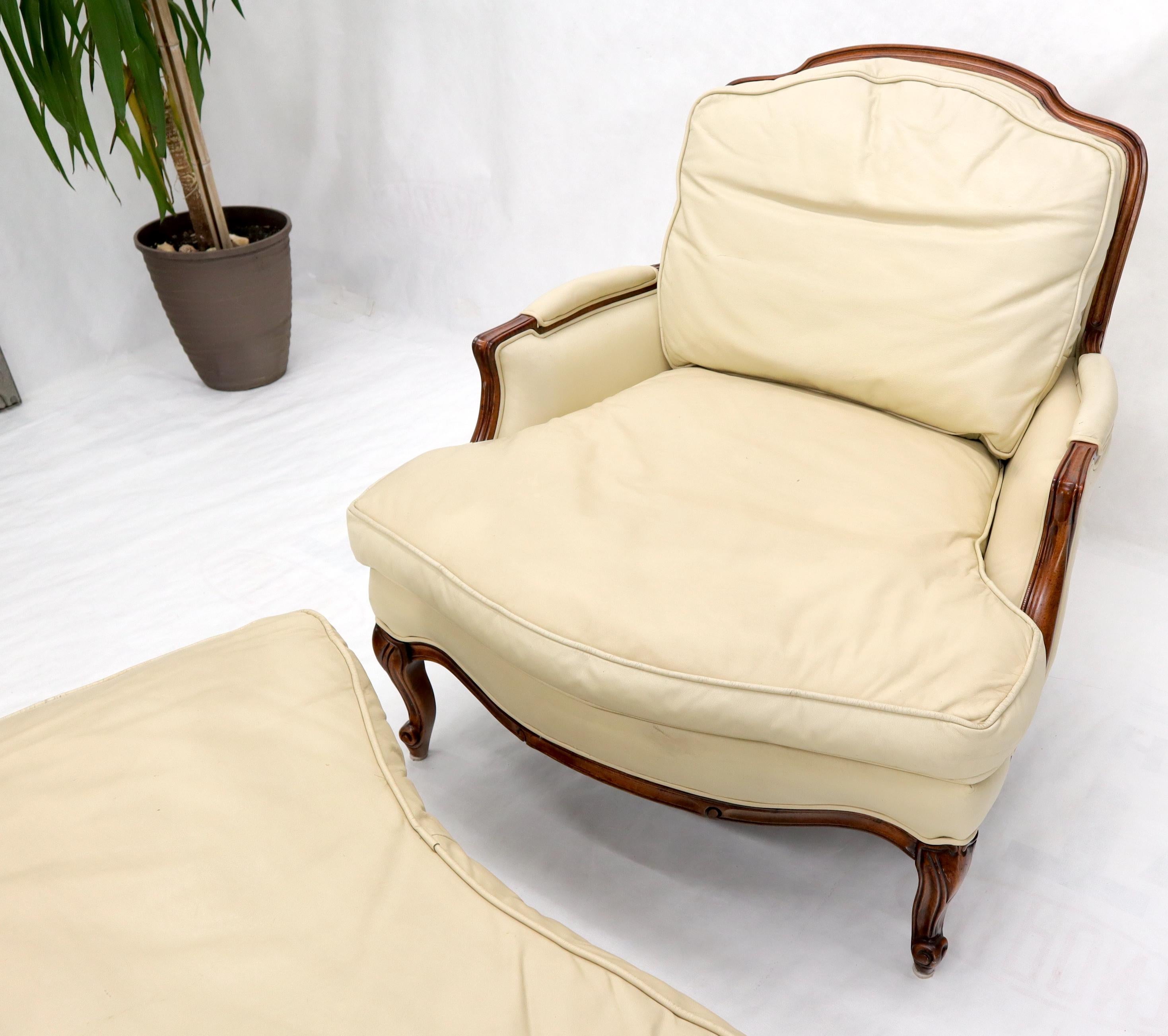 cream leather chair and ottoman