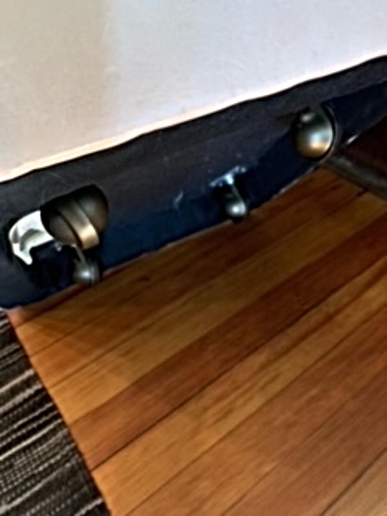 Cream Leather Ottoman with Caster Wheels For Sale at 1stDibs