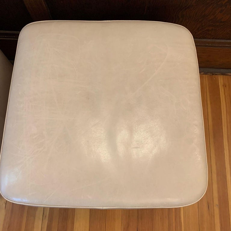 Cream Leather Ottoman with Caster Wheels For Sale at 1stDibs