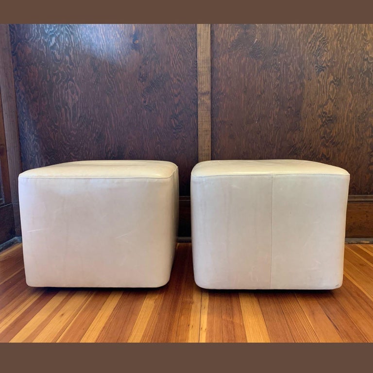 Cream Leather Ottoman with Caster Wheels For Sale at 1stDibs