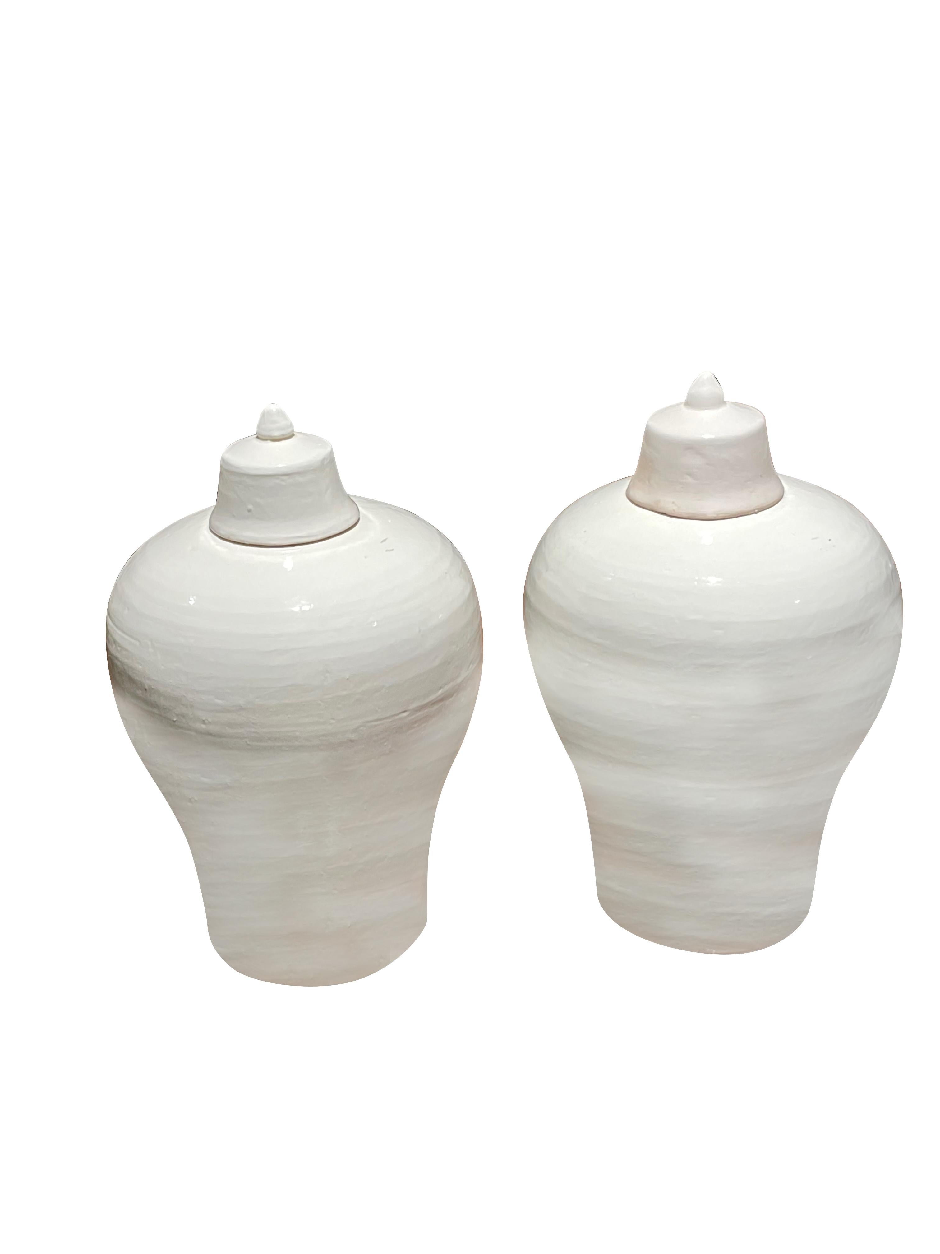 Contemporary Chinese lidded cream vase.
Ginger jar shape.
Two available and sold individually.