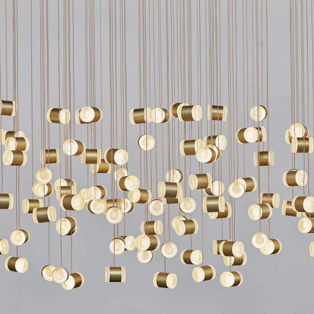 Cream light chandelier by Llot Llov
Dimensions: W 210 x H 163 cm
Materials: Material: Reused Facecream Containers, Anodized Aluminium, Coaxial Cabel, MDF

In cooperation with a German cosmetics company as provider of materials and an upcycling