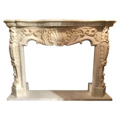 Cream Marble Hand Carved Mantel with a Center Shell Carving