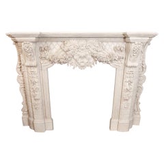 Cream Marble Mantel with Extensive Hand Carving, Foliate Design