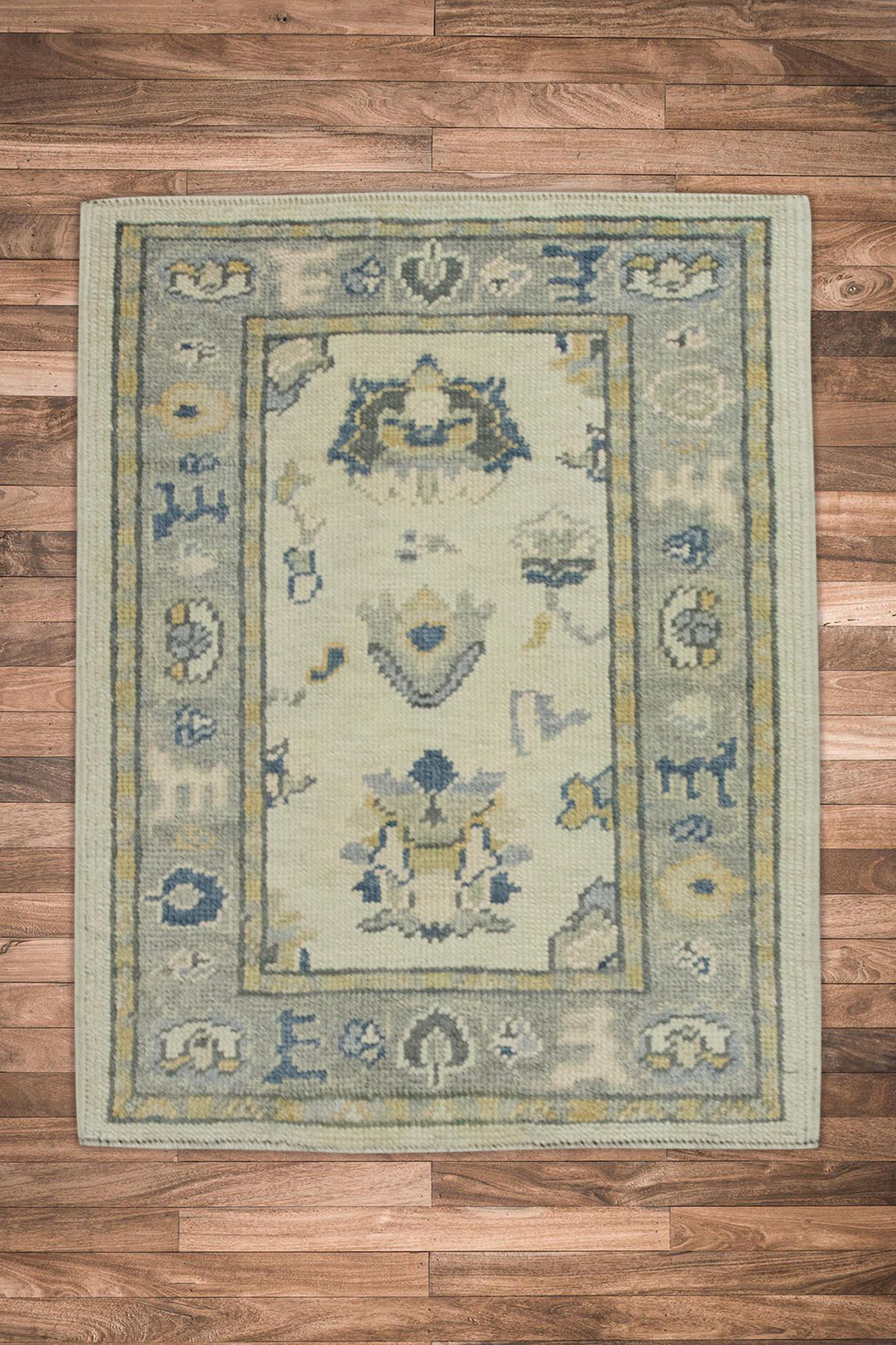 Contemporary Cream Multicolor Floral Design Handwoven Wool Turkish Oushak Rug For Sale