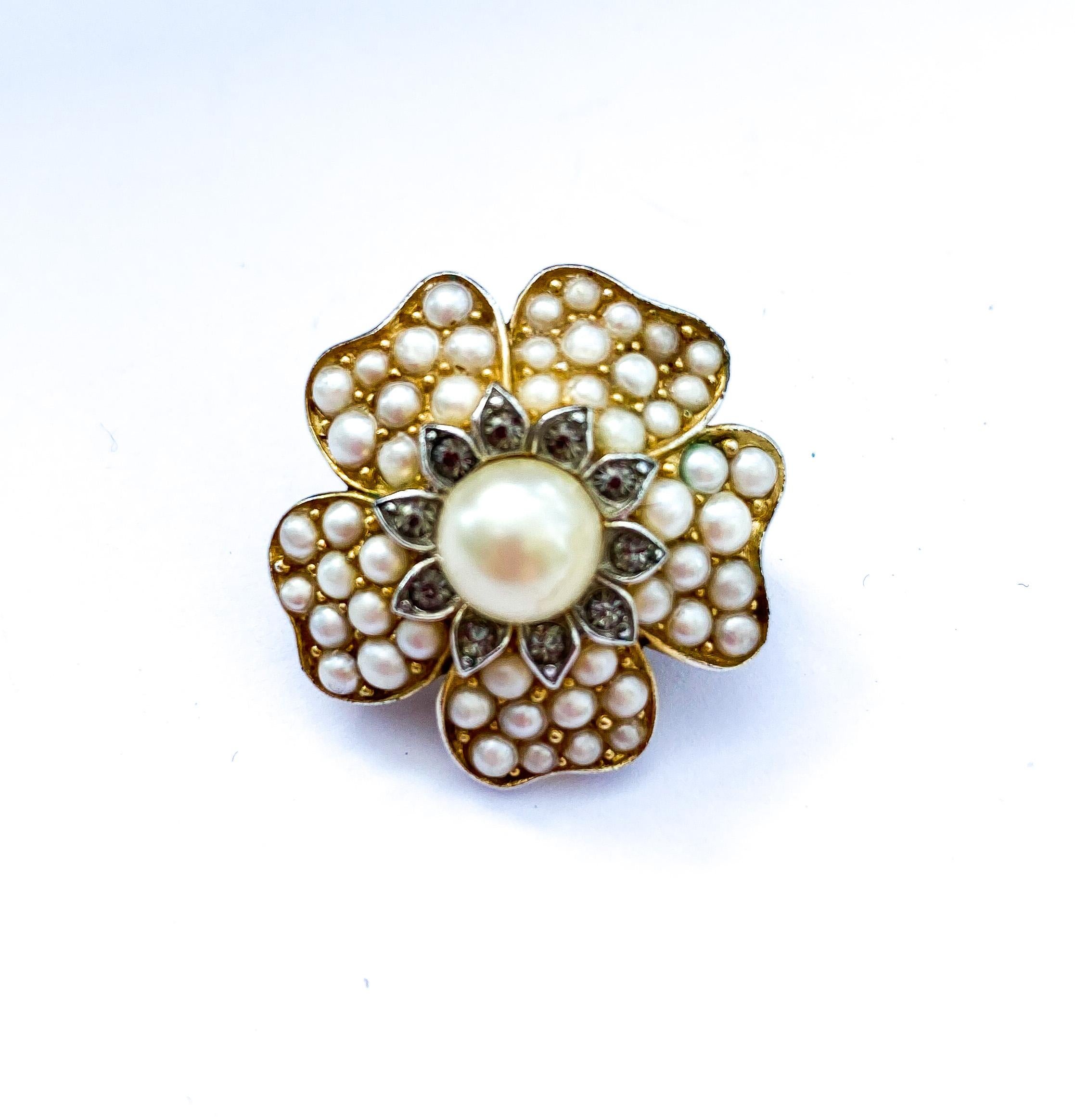 Cream pearl, gilt metal and grey paste 'flower' earrings, Trifari, USA, 1960s. In Excellent Condition For Sale In Greyabbey, County Down