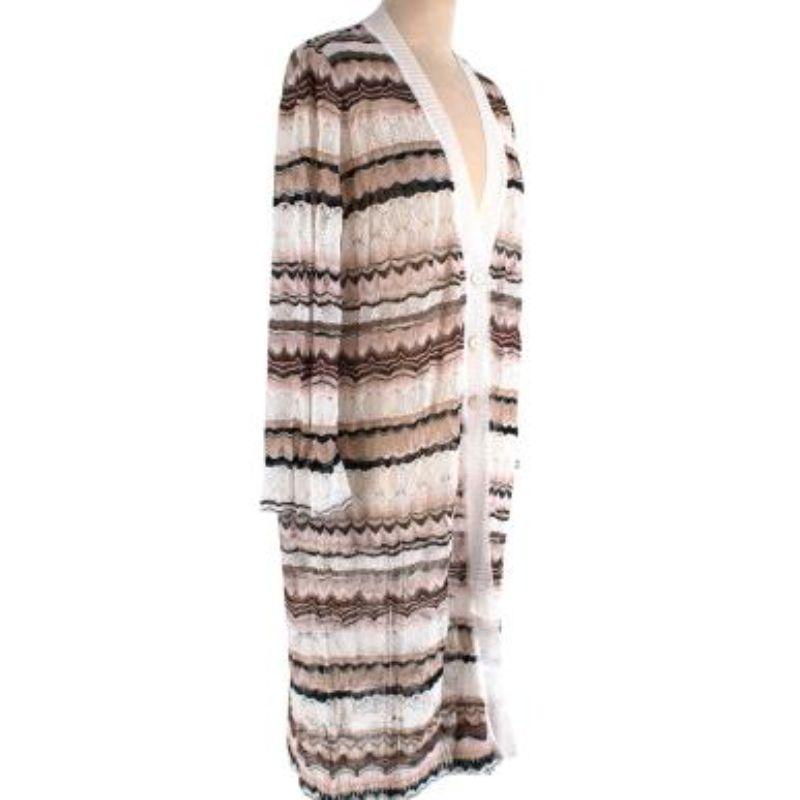 Missoni Cream & Rose Longline V-Neck Cardigan
 
 -creme, black and rose lace knit cardigan with long sleeves
 -White longline v-neck 
 -button-down closure
 -longline style
 
 Made in Italy
 
 Professionally dry clean
 Perchlorethylene
 Steam only

