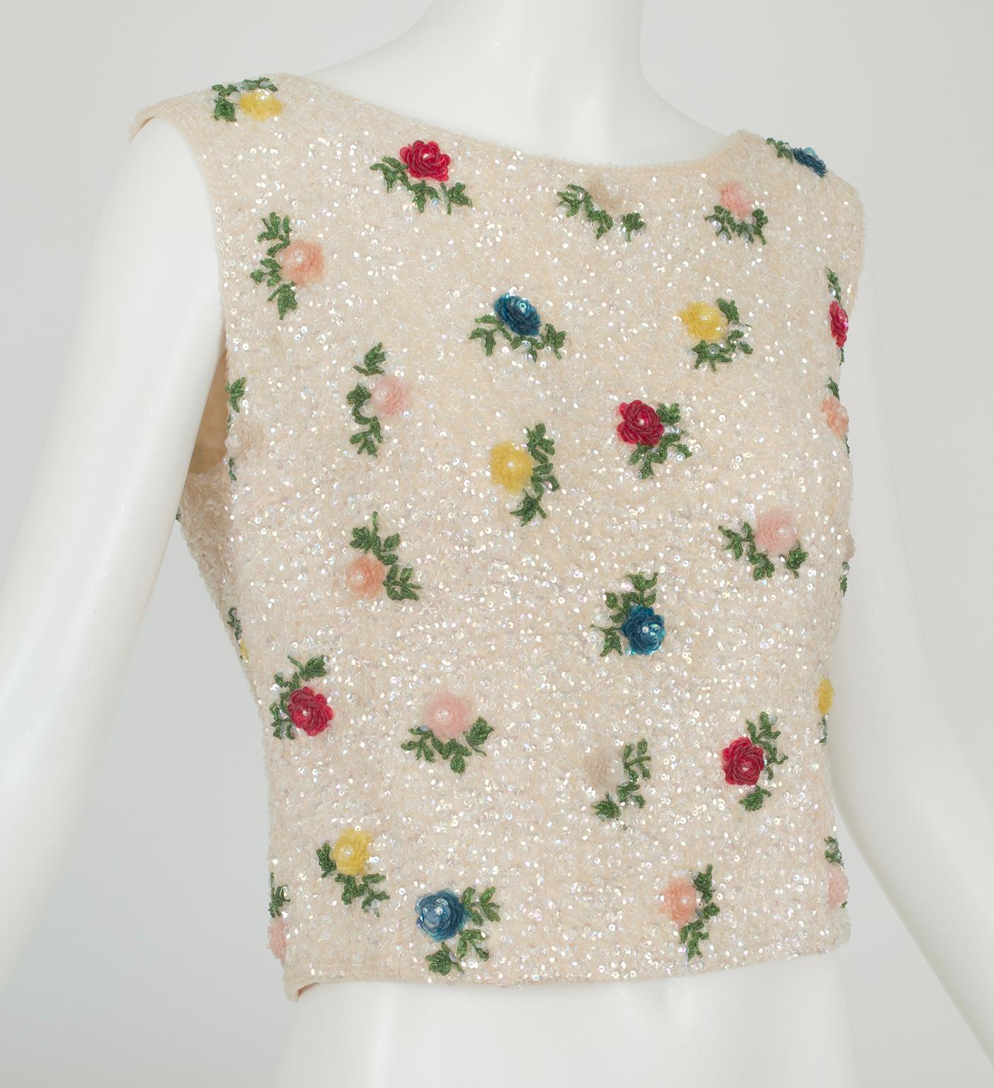 Sleeveless cropped shell of cream wool covered with pavé of clear aurora borealis sequins; strewn with dimensional sequin roses of pink, blue, red, yellow and gray with green seed bead leaves and stems. Full metal zip back closure; fully lined in