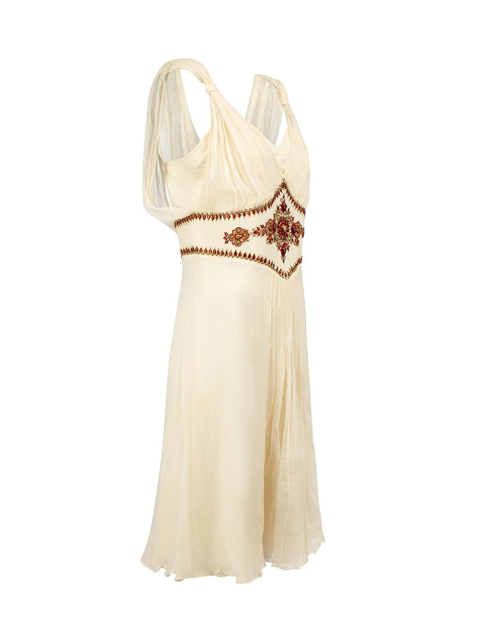 CONDITION is Good. General wear to dress is evident. Moderate signs of discolouration at under arm and right side of dress on this used Temperley designer resale item.



Details


Cream

Silk

Mini dress

Red and gold bead