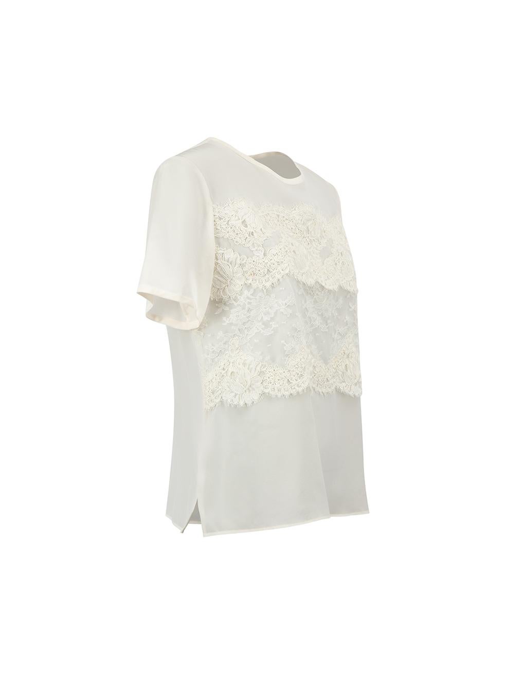 CONDITION is Good. Minor wear to blouse is evident. Light wear to fabric with small mark at centre front and small marks on lace overlay of this used Oscar de la Renta designer resale item. We recommend dry-cleaning this item before