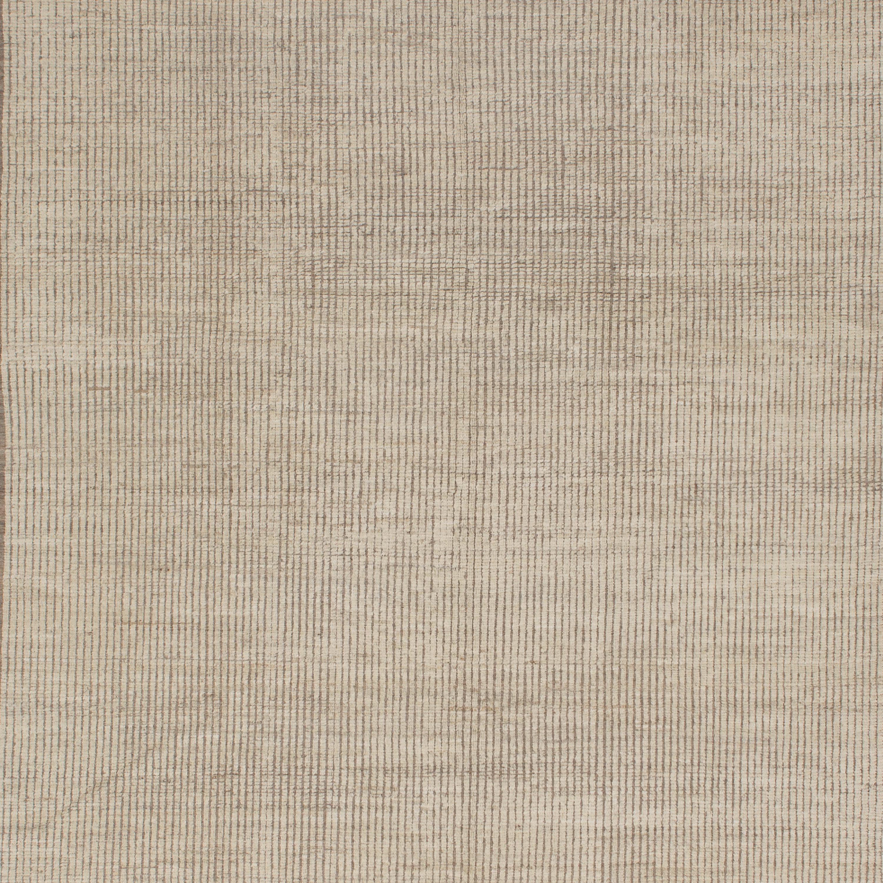Inspired by the grounding foundations of Earth's natural colors and pure materials, this Cream Zameen Transitional Wool Rug - 9'4