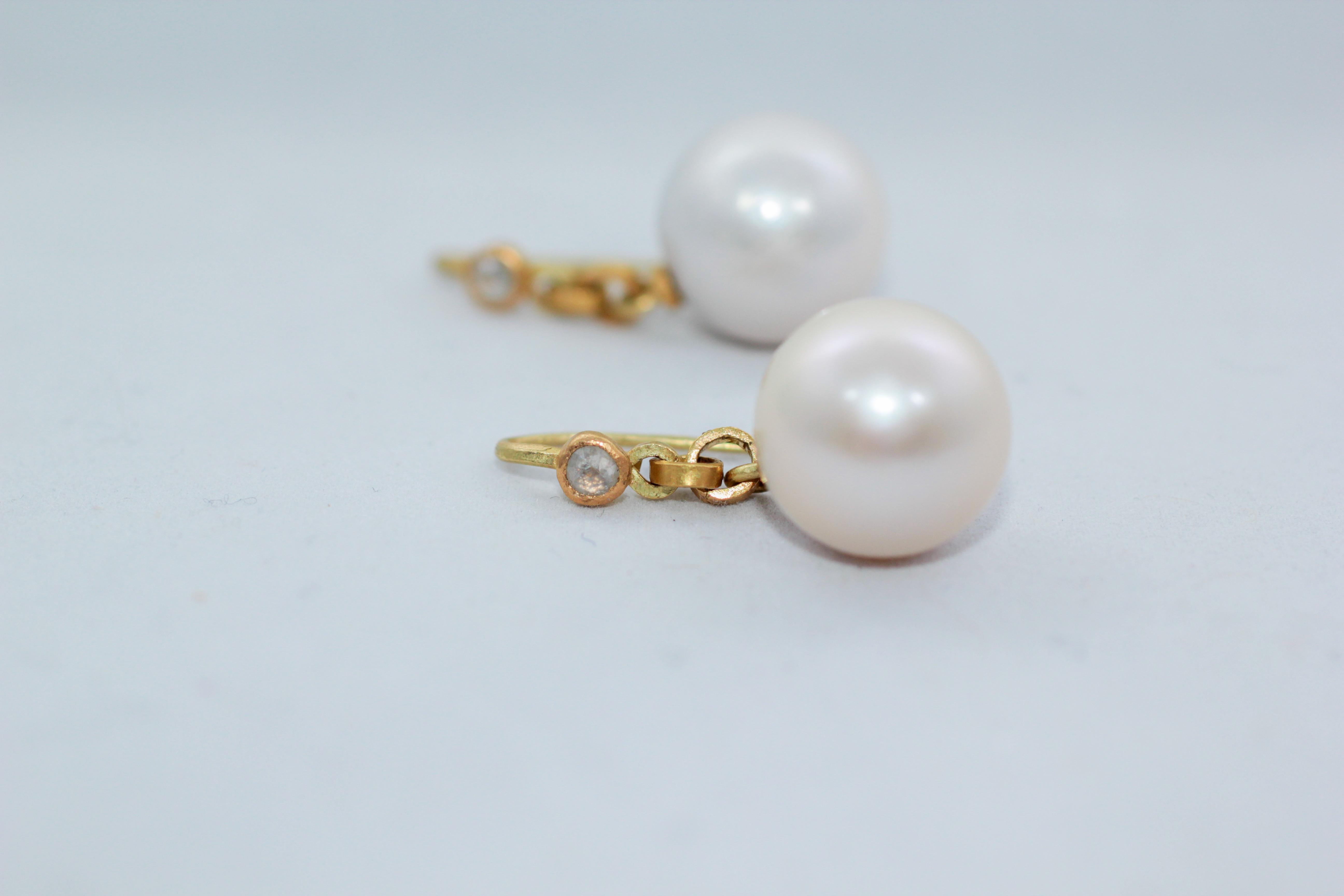 Custom order. Daylight Drop Earrings. These 21K gold elegant contemporary dangle earrings are an update to an all-time classic. Nature's marvel, a large 16mm South Sea Pearl is highlighted by rose-cut white diamonds and a small spray of sparkly pink