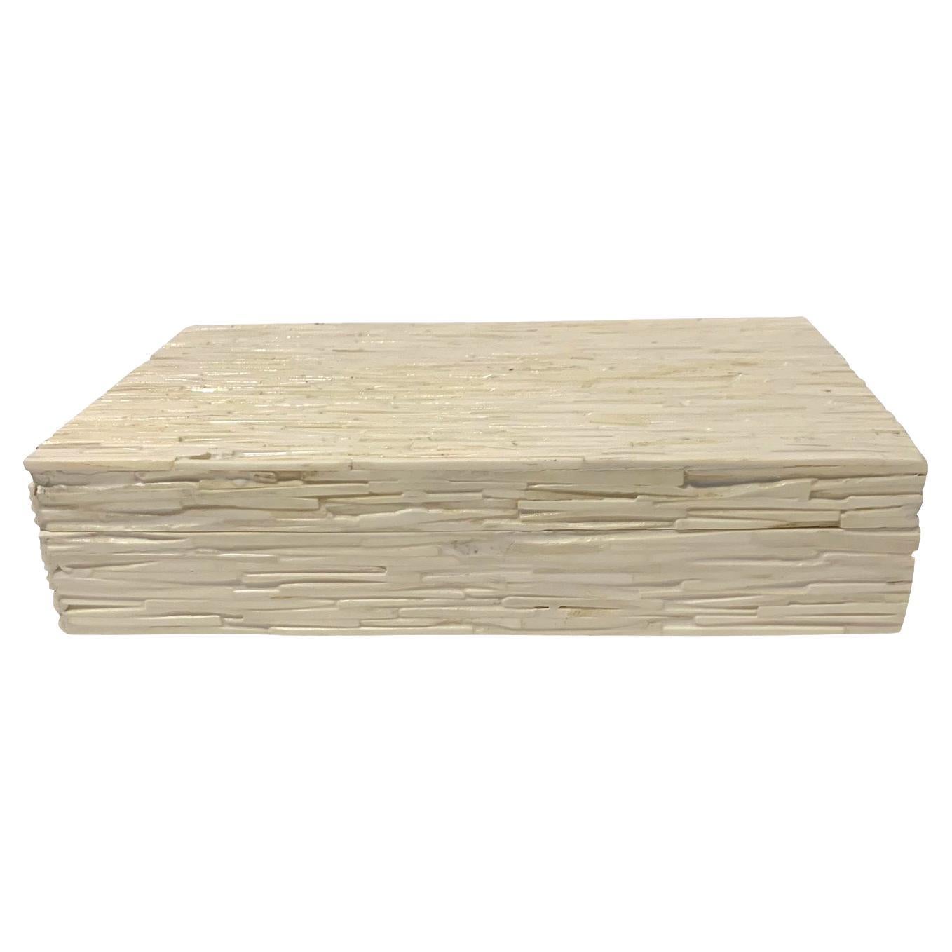 Contemporary Indian natural cream colored lidded bone box.
Composed of a mosaic of slices of bone.
Also available in a smaller size ( S6532 ).
Part of a large collection of bone boxes.