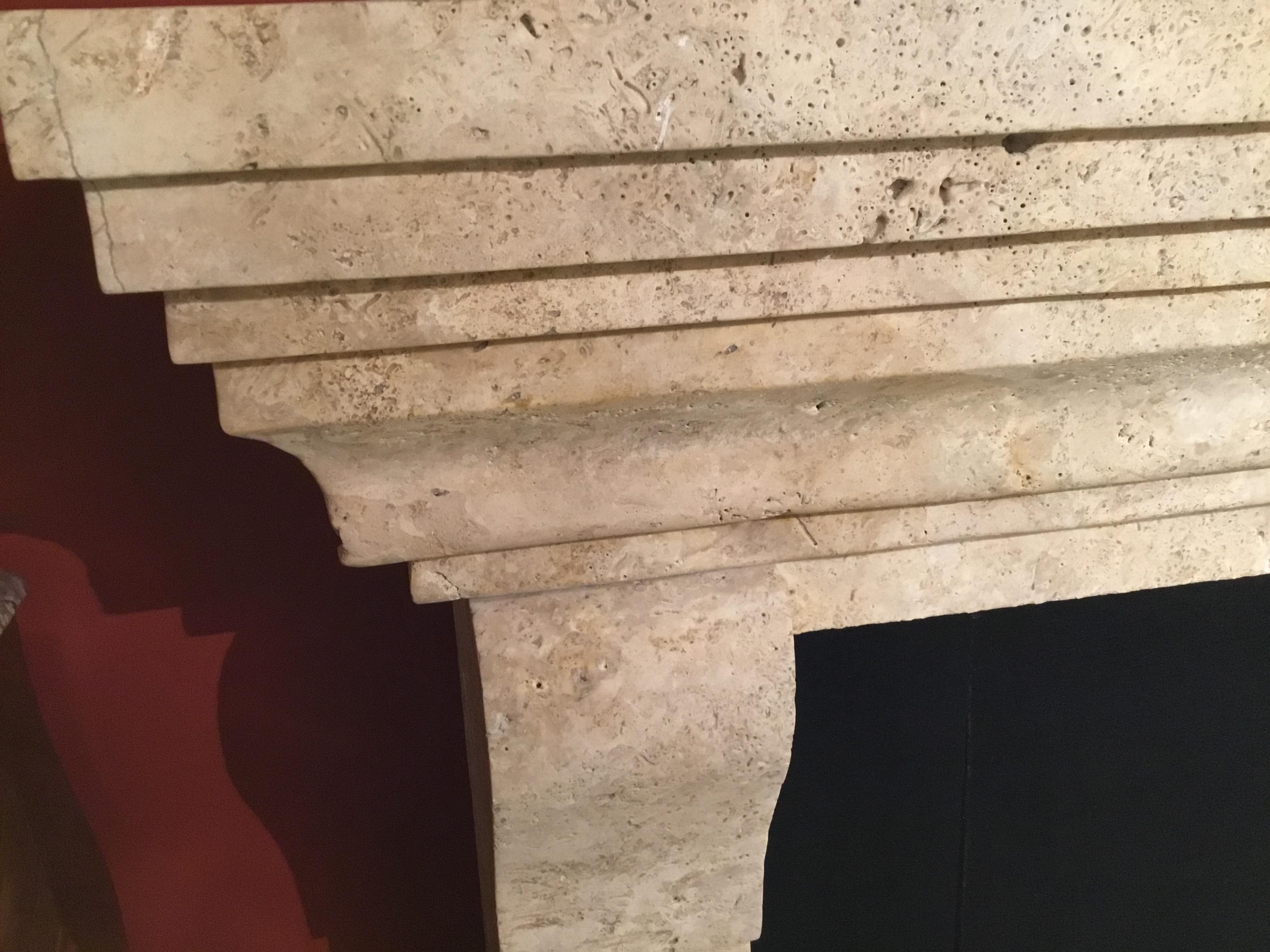 Handsome travertine mantel with curved side legs and a stacked look at the top
Of this interesting design. Great piece to use in contemporary or traditional settings.
This piece is in my gallery and ready for immediate shipment.