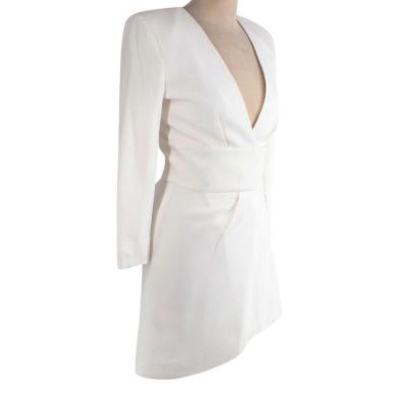 Alexandre Vauthier Cream Waisted Mini Dress
 
 -Waisted hook fastening 
 - Shoulder pads 
 -Fully lined silk 
 -Pleated detail
 -V-neck
 -Long sleeve 
 
 Composition: 
 50% Acetate 
 50% Viscose 
 
 Made in Portugal 
 Dry clean only 
 
 9/10