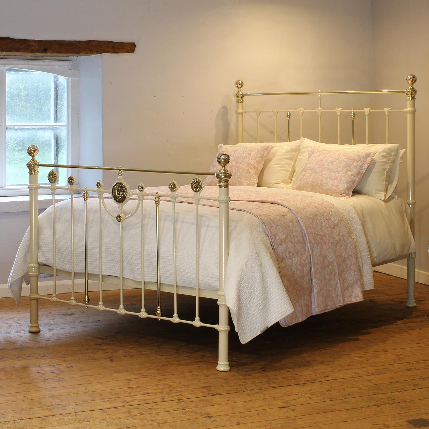 An attractive cast iron Victorian antique bed finished in cream with rosette decoration on the foot panel.

This bed accepts a UK king size or US queen size (5ft, 60in or 150cm wide) base and mattress set.

The price includes a standard firm bed