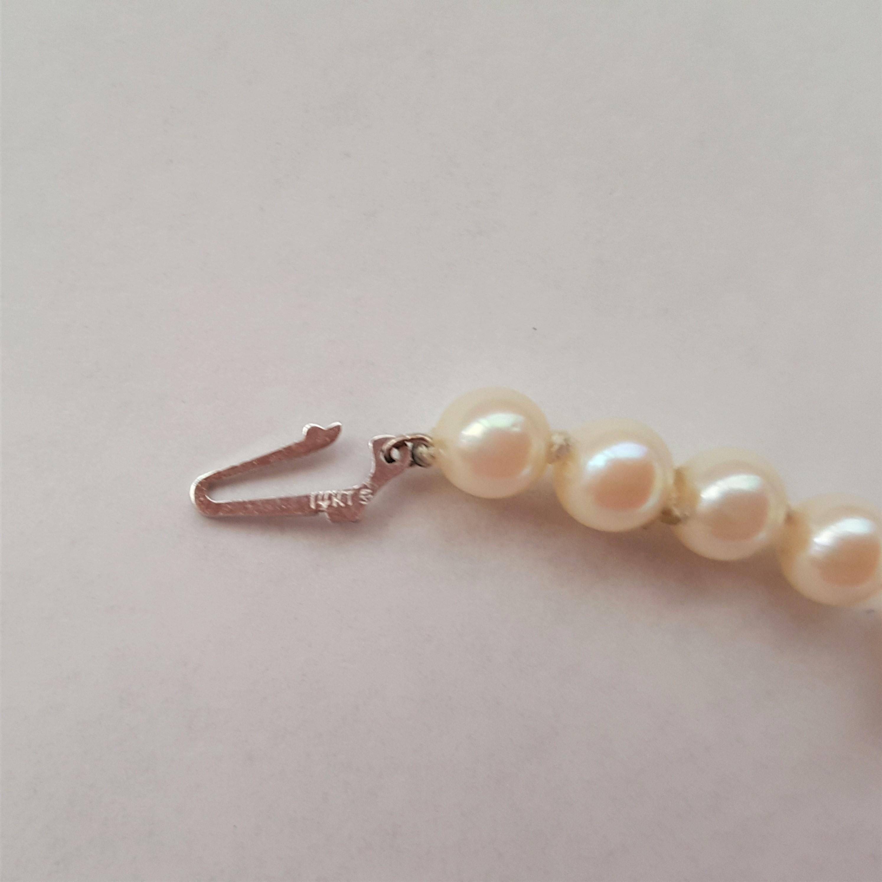 Perle de culture effilée de couleur crème et blanche Grade AA, 14 carats, 20 pouces, 4,5-8,5 mm Bon état - En vente à Rancho Santa Fe, CA