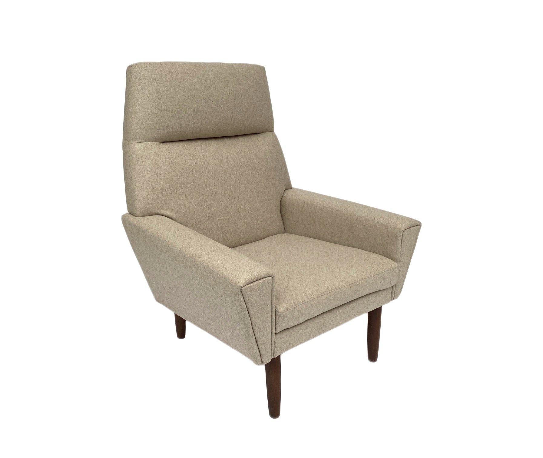 A beautiful Danish cream wool and teak highback armchair, this would make a stylish addition to any living or work area.

The chair has a wide seat and padded backrest for enhanced comfort. A striking piece of classic Scandinavian