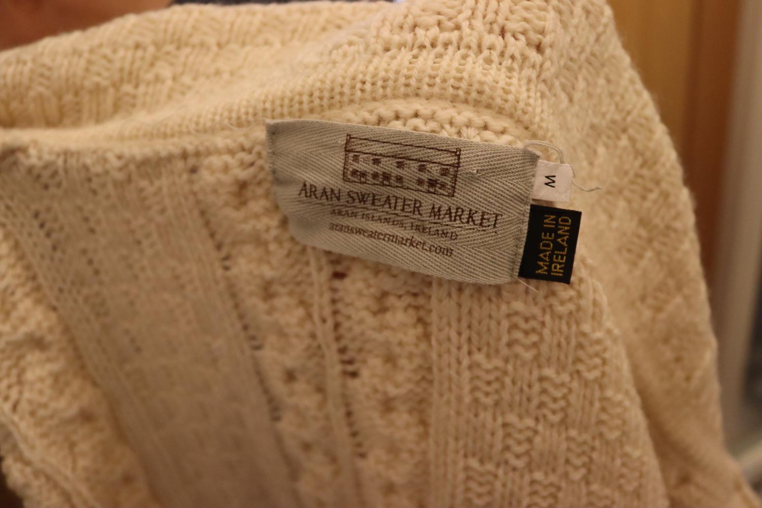 A wonderful Aran knit cardigan /jacket/ The cardigan was made in Ireland  and has a wonderful mix of knit styles.  it has a button front, with collar detail.
Size M, Measurements Bust up to 44'' , length 26''