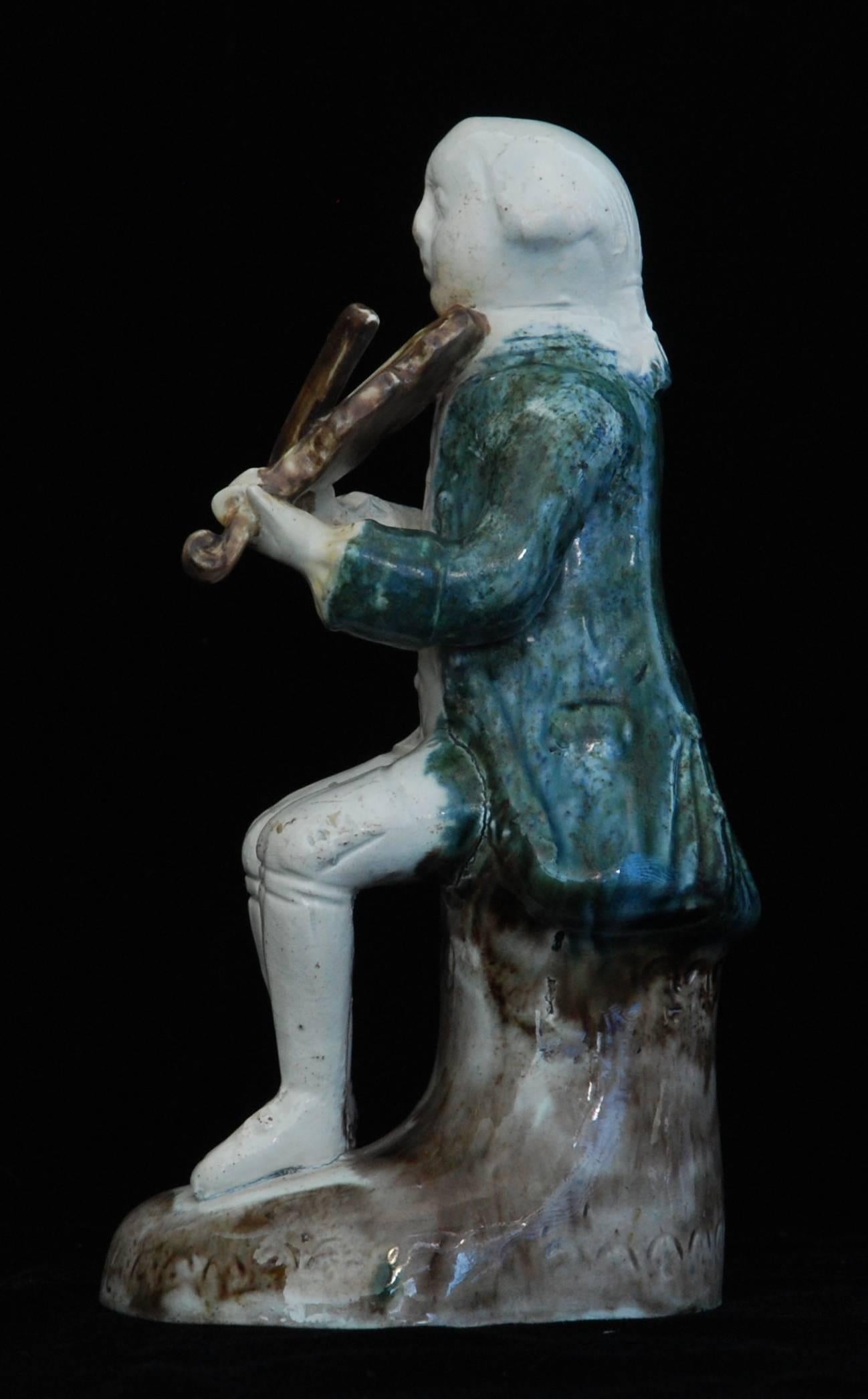 English Creamware Figure of a Violinist, Ralph Wood Sr, circa 1745