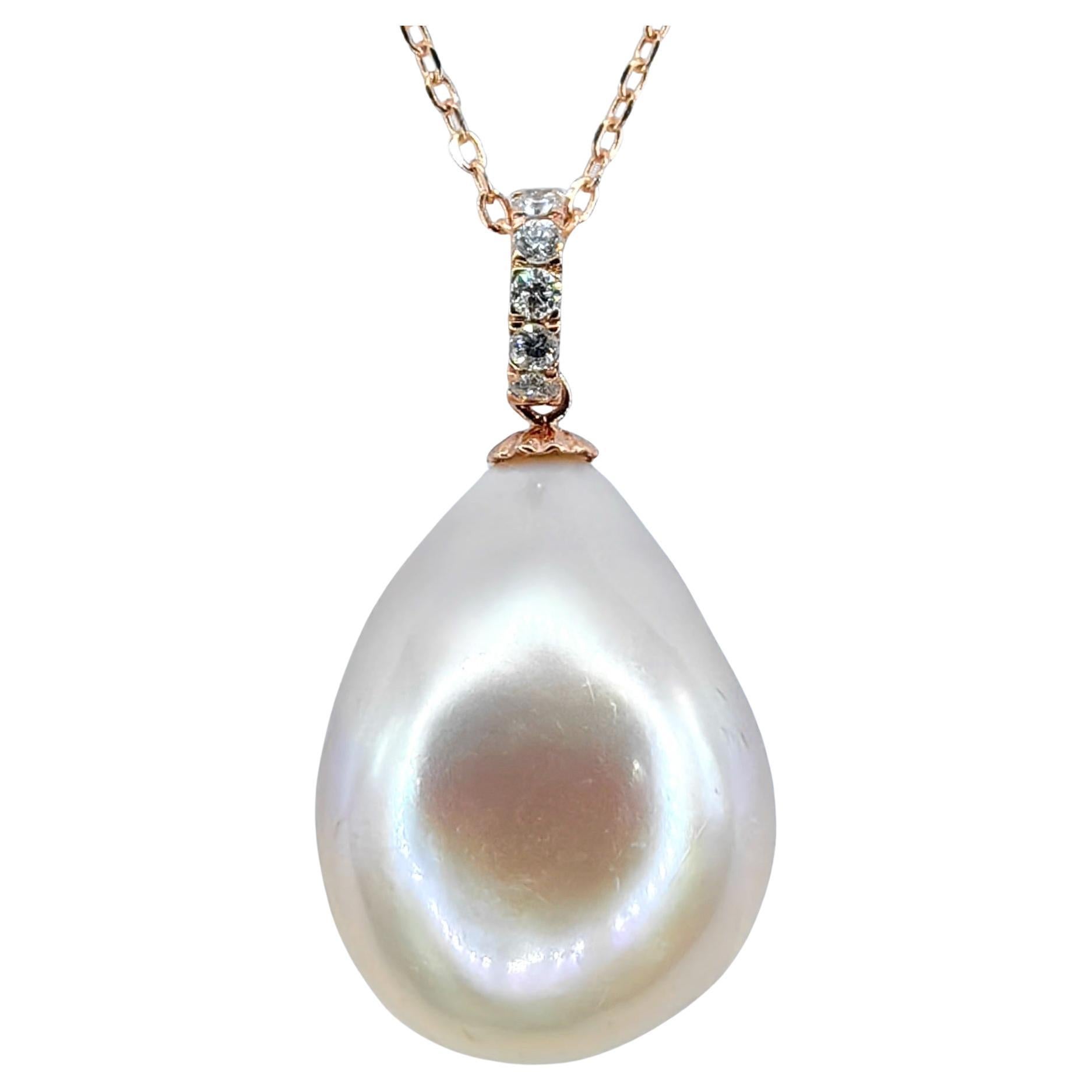 Ciondolo perla barocca rosa-pesca con diamante in oro rosa 18 carati in vendita