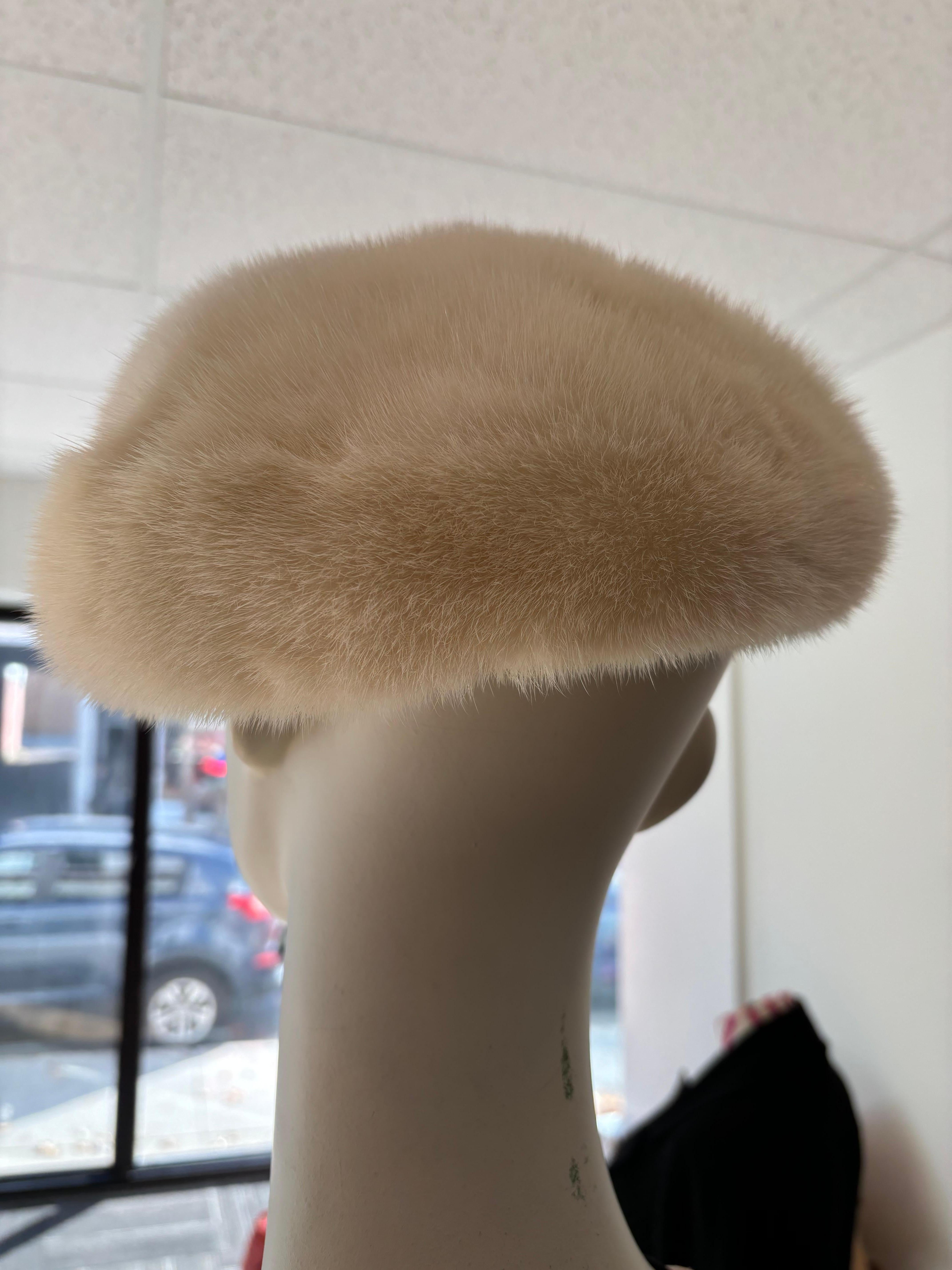 On offer is a luxurious mink hat in the shape of a beret created by Andre This mink hat is in excellent condition and still has part of its original tag, and sold by Eaton's an iconic Canadian chain of stores which has now closed. Look at the