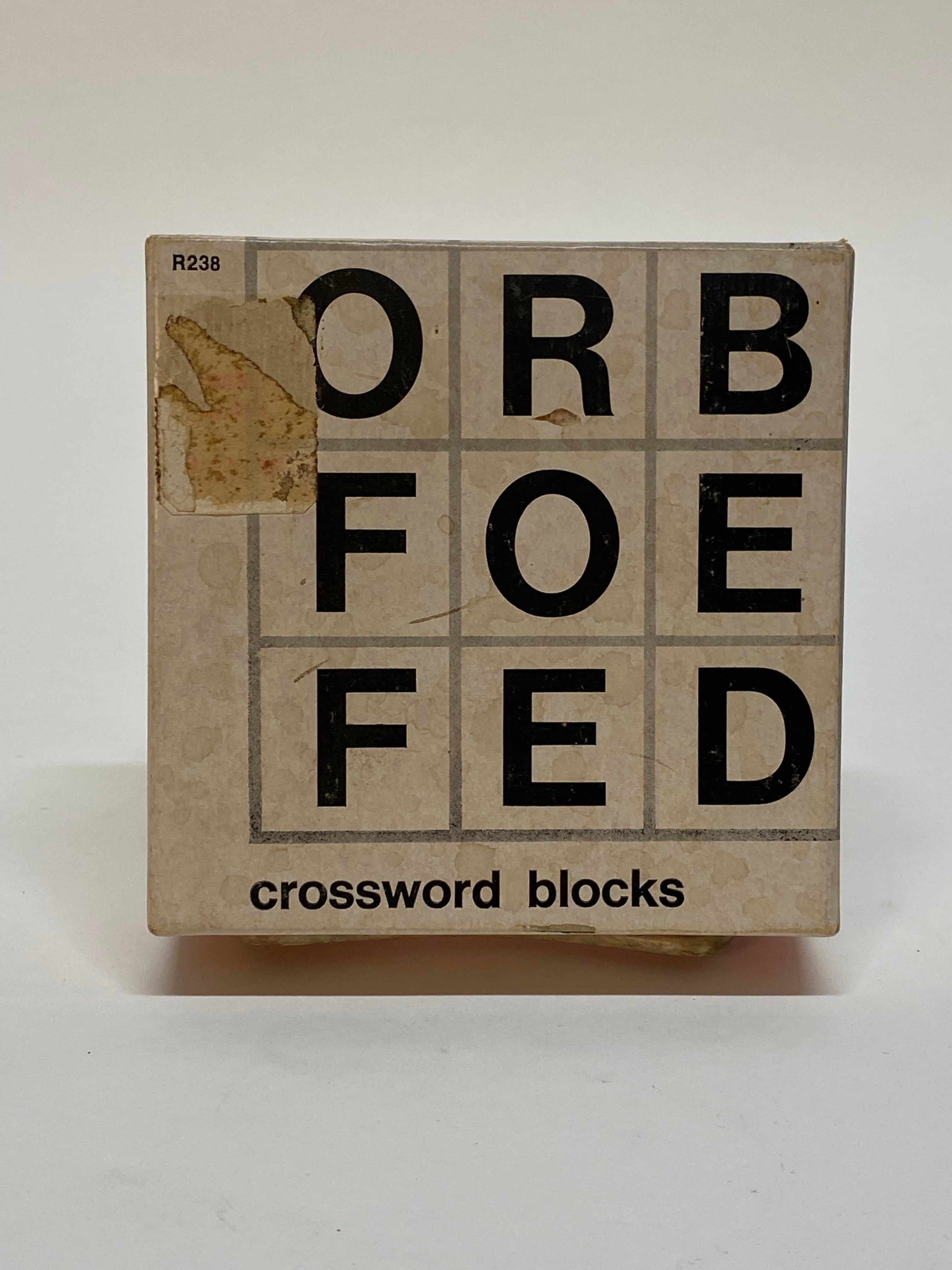 Wood crossword blocks puzzles by Creative Playthings, Princeton, New Jersey. Circa 1967. Instructions included. Solid wood cubes with vibrant orange lettering. Never mind the phone or the game console. Creative Playthings was intellectually a cut