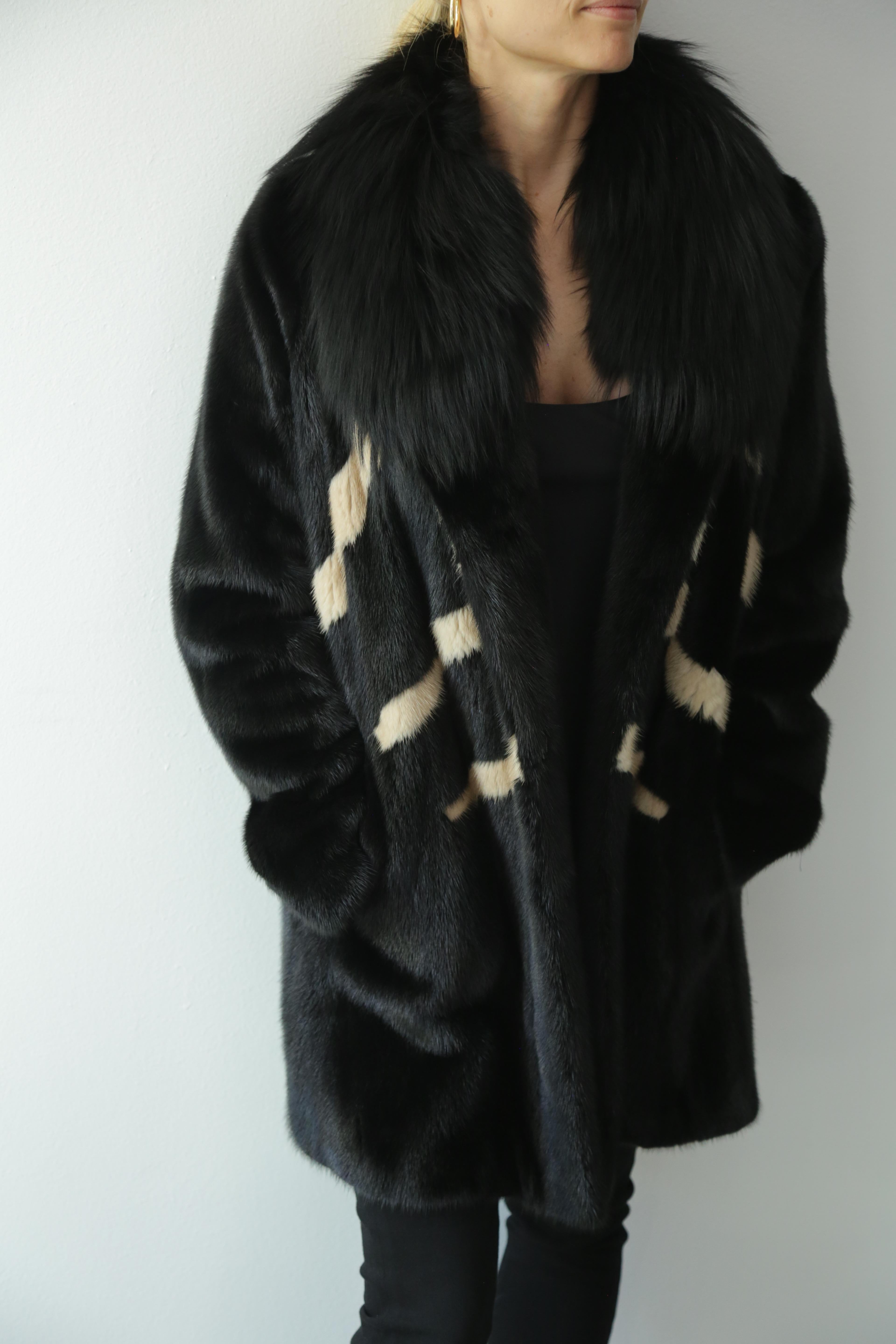 Caramel and Black **New never worn**  (NWT) coat. 
Original Price was $14,000
Size 6 
Body Real Fur Dyed and Natural Mink 
Collar Dyed Silver Fox 
Lining 100% Silk 
Pockets on the side 
Made in USA 
