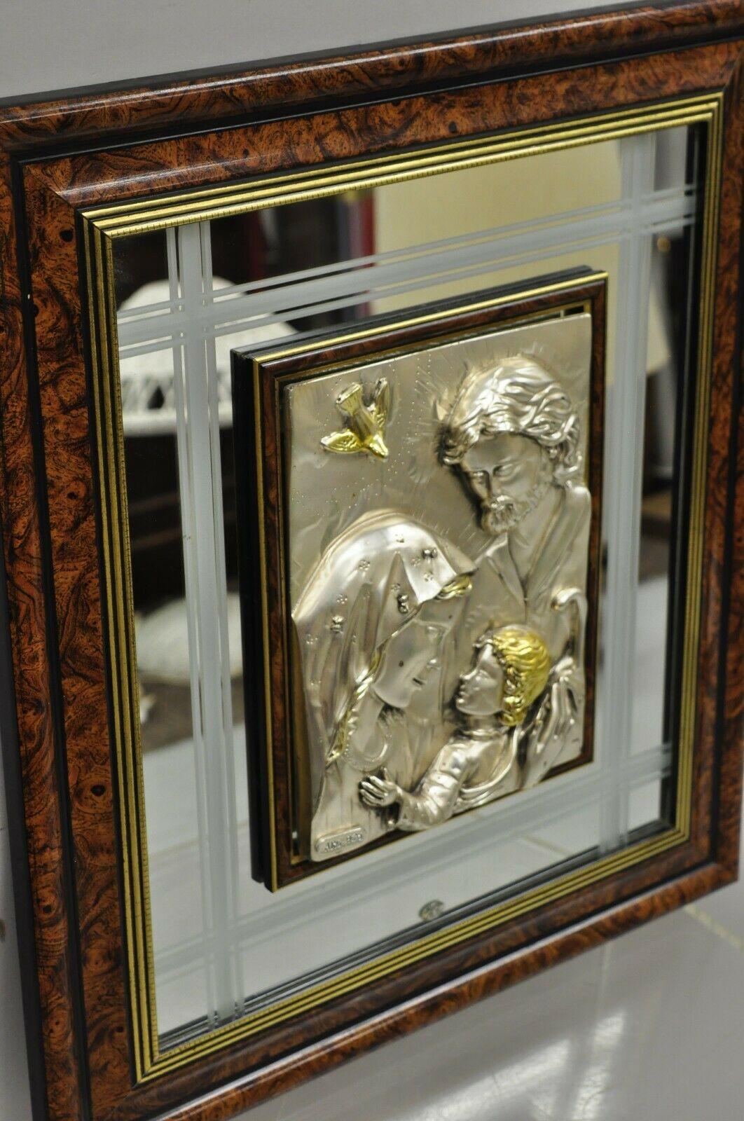 Creazioni Artistche 925 Sterling Silver ARG Italy Jesus Mary Mirror Wall Art. Item features a burlwood frame, mirror backing, debossed sterling silver *925* scene of Jesus, Mary, and Joseph, labels to rear and 