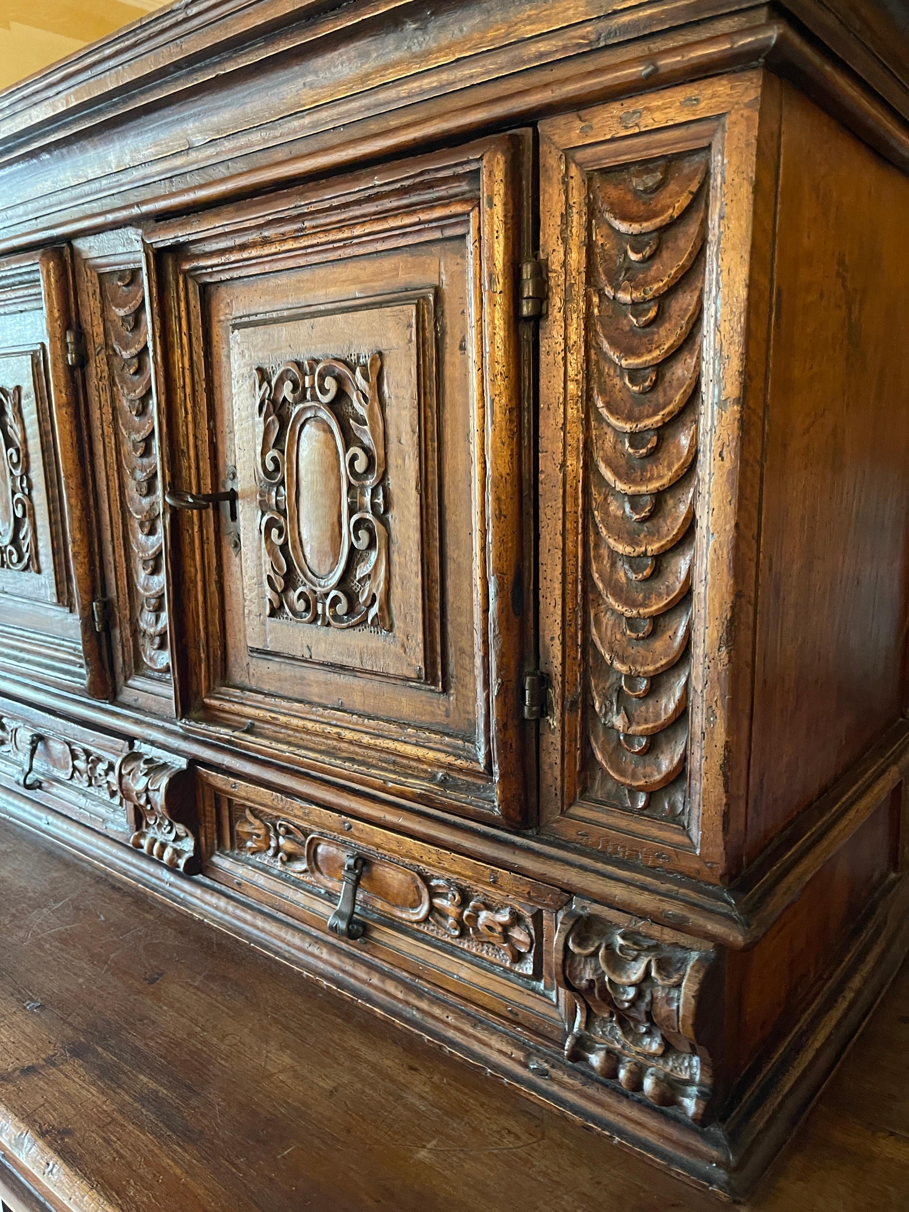 Hand-Carved Walnut double-bodied sideboard, Tuscany, late 16th century For Sale