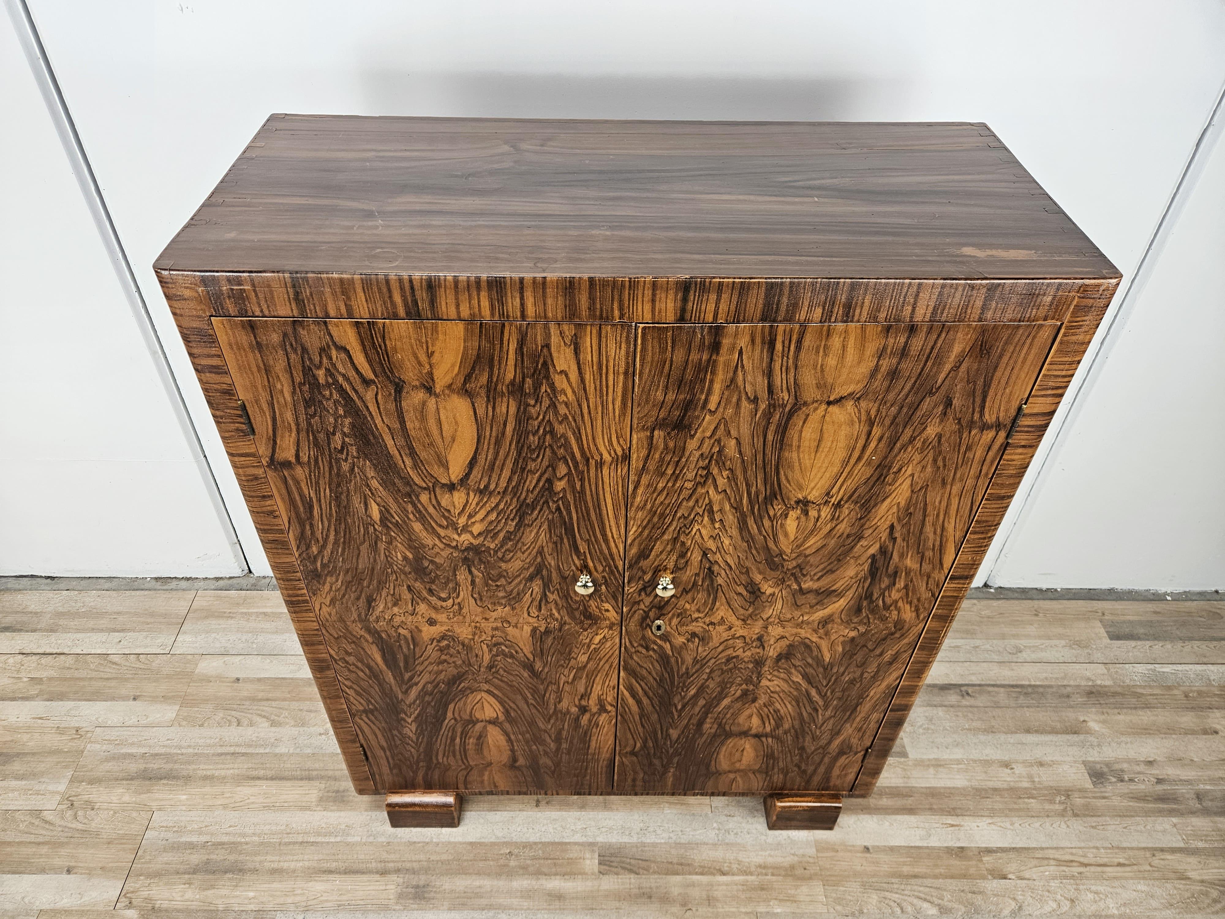 Antique 1940s mahogany wood sideboard with interior shelves and fir wood frame.

Multipurpose furniture, can be used in any context and decor.

Normal marks from age and use, polished with shellac.