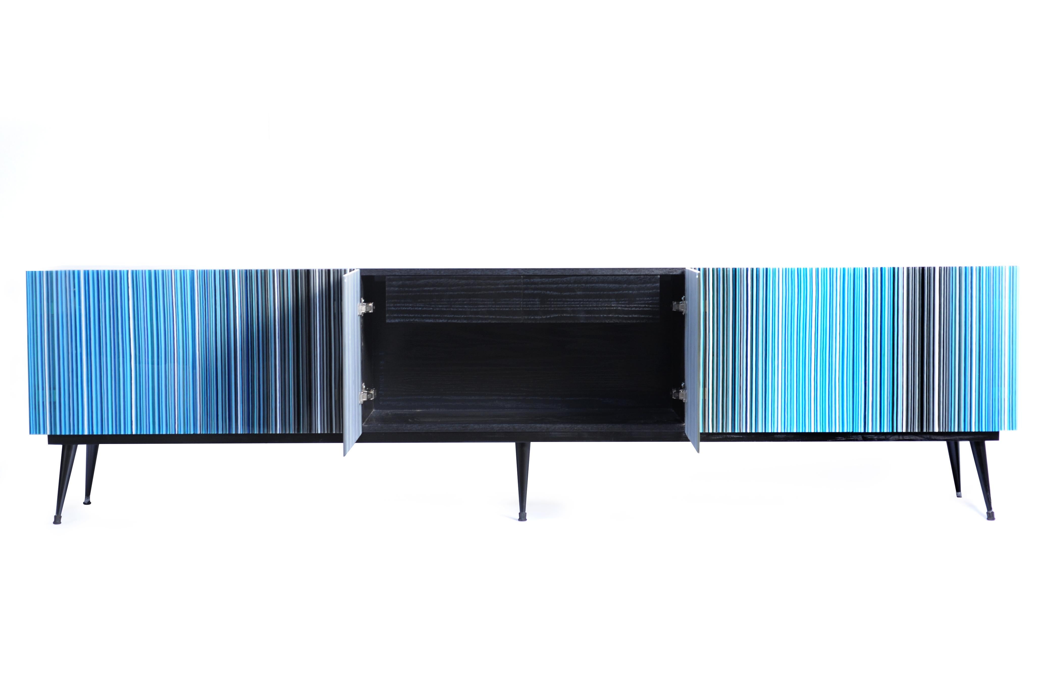 Credenza designed by Orfeo Quagliata in collaboration with Taracea Furniture. An object of fused glass created with the exclusive barcode technique. The Buff-Hey´s retro design mixed with designer's exceptional glass expertise put together a cutting