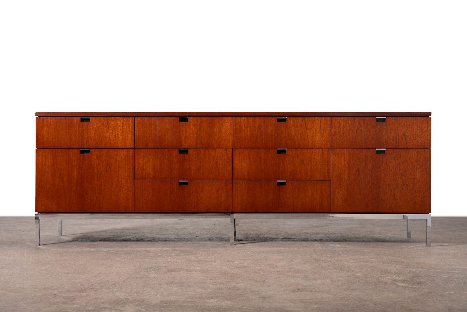 Credenza designed by Florence Knoll for Knoll International 1961. This example is in very good condition, constructed with teak featuring ten drawers and chromed steel base.