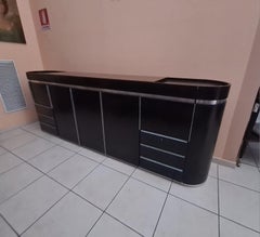 Dérive arrondie en bois et en acier des années 1980