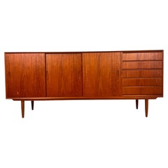 Danish teak sideboard with sliding doors and drawers, 1960s