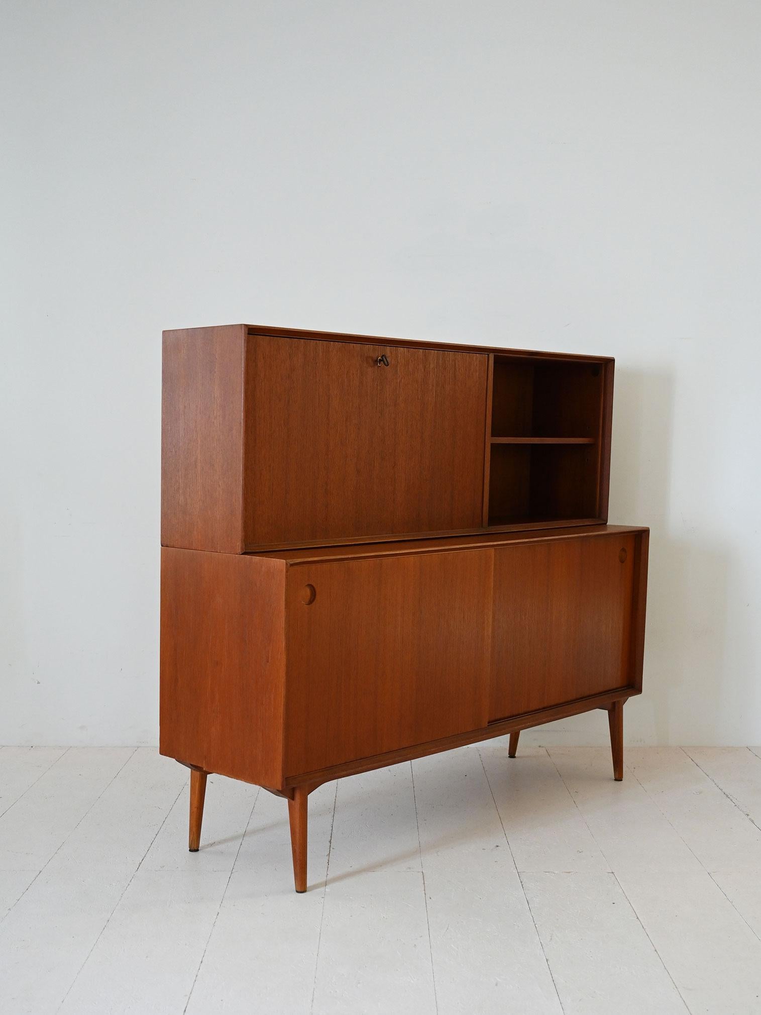 Teak Vintage Danish sideboard with flap and sliding doors For Sale