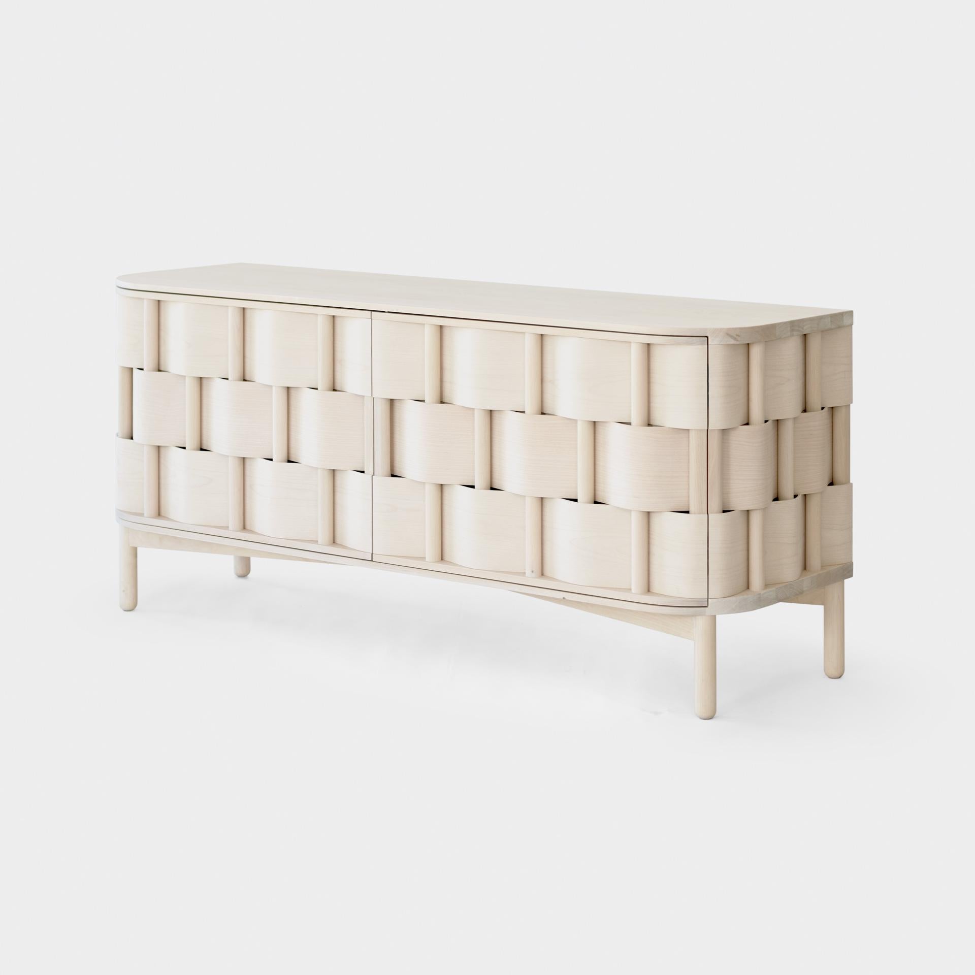 Weave 133 Birch wood, natural oil 
Credenza made of solid birch wood and birch veneér. Modern yet Classic, bold yet modest the cabinet serves as a great example of Scandinavian contemporary design. Designed by Lukas Dahlén.

The minimal yet