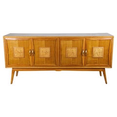 Vintage Maple sideboard with decorated doors and carved edges 20th century