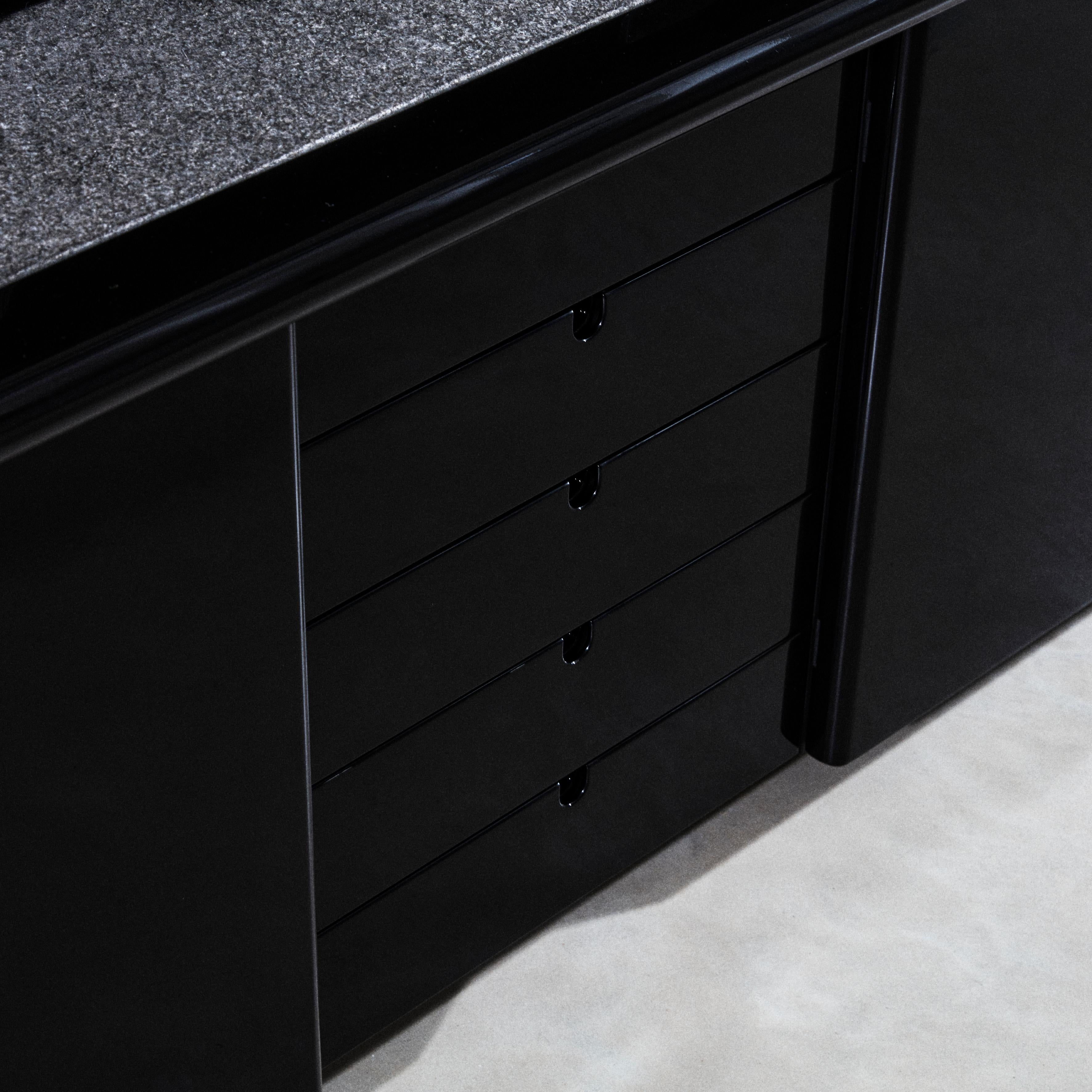 Italian Black lacquered wood and stone sideboard. Drawing Guido Faleschini For Sale